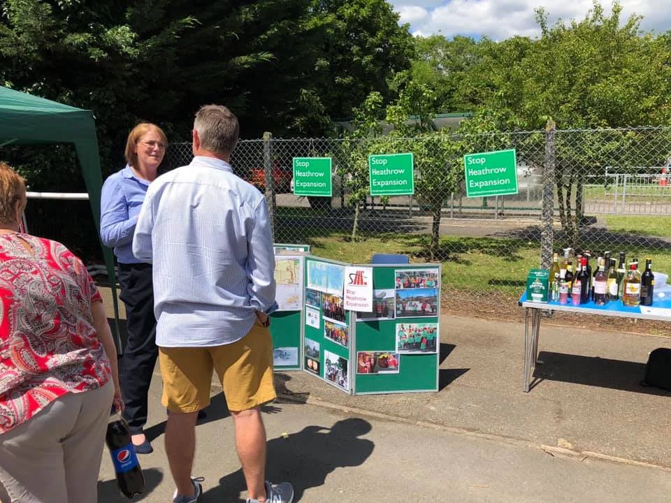 Geraldine from Stop Heathrow Expansion, chatting to parents.