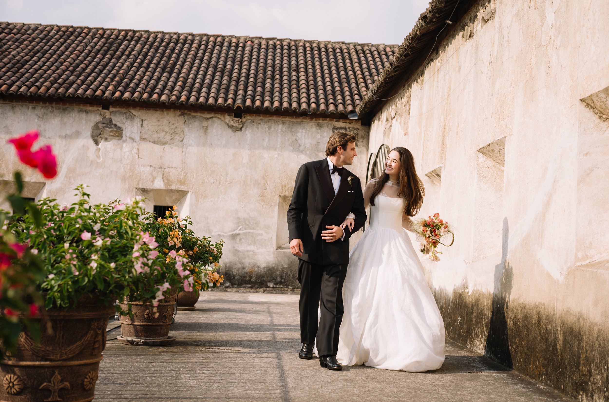Candid moment between the bride and groom during their wedding in Antigua Guatemala