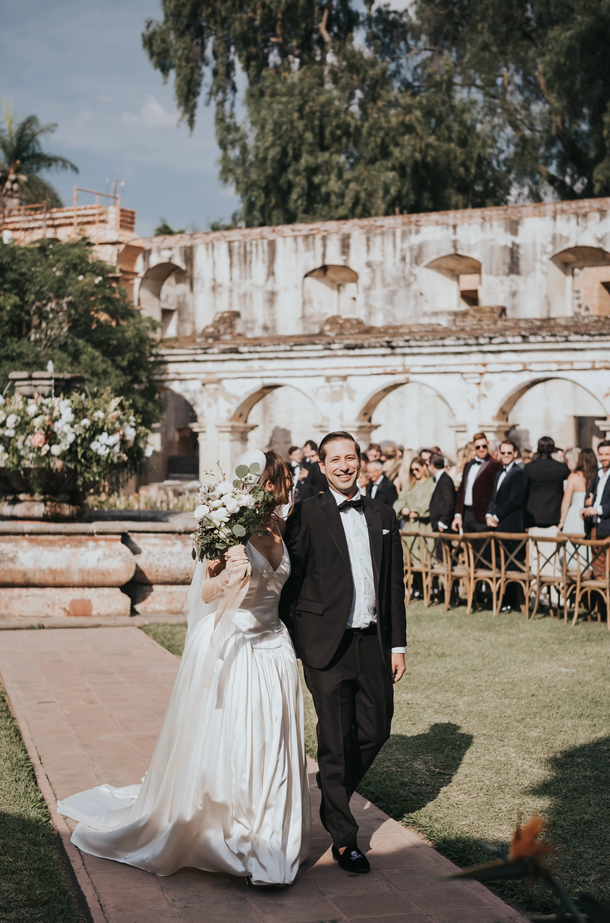 Destination wedding reception inside the open-air colonial ruins of Santa Clara in Antigua Guatemala.