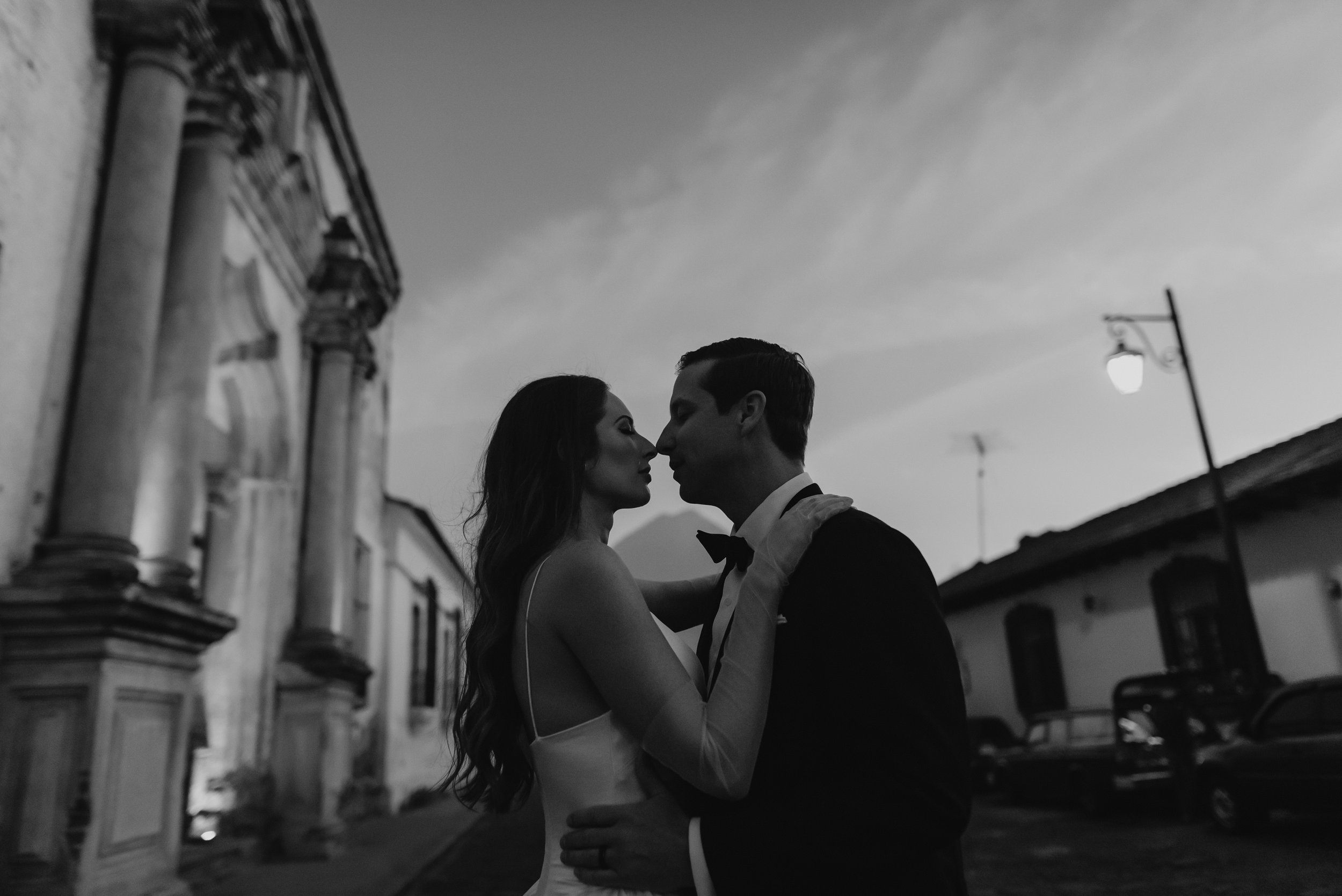 Editorial street wedding portrait of the bride and groom in Antigua Guatemala.