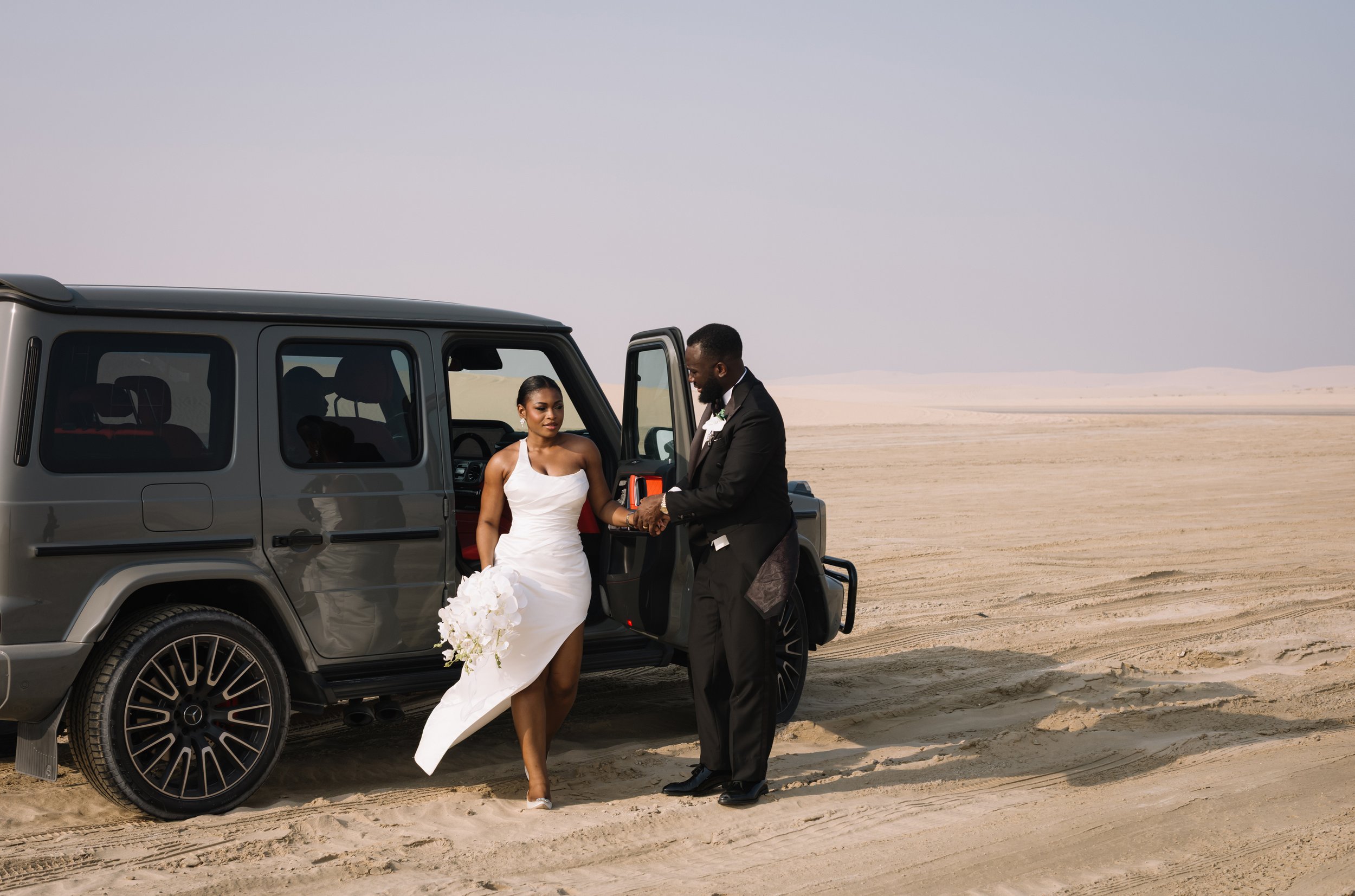 Editorial wedding couples portrait in the Qatar desert