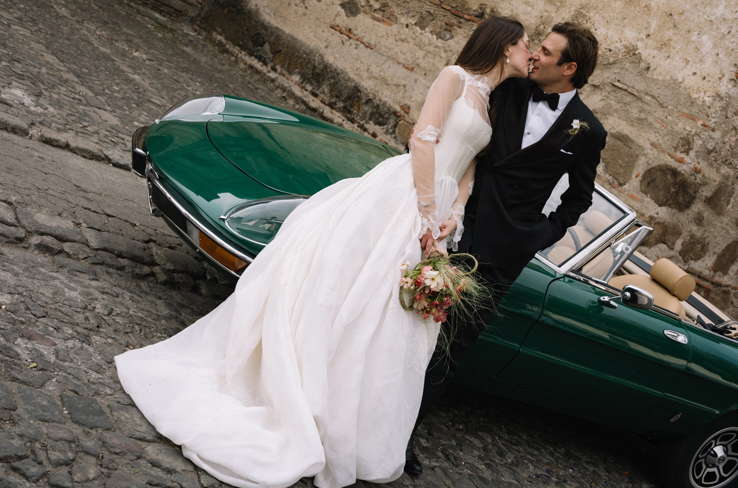 Wedding portraits with a vintage Alfa Romeo car