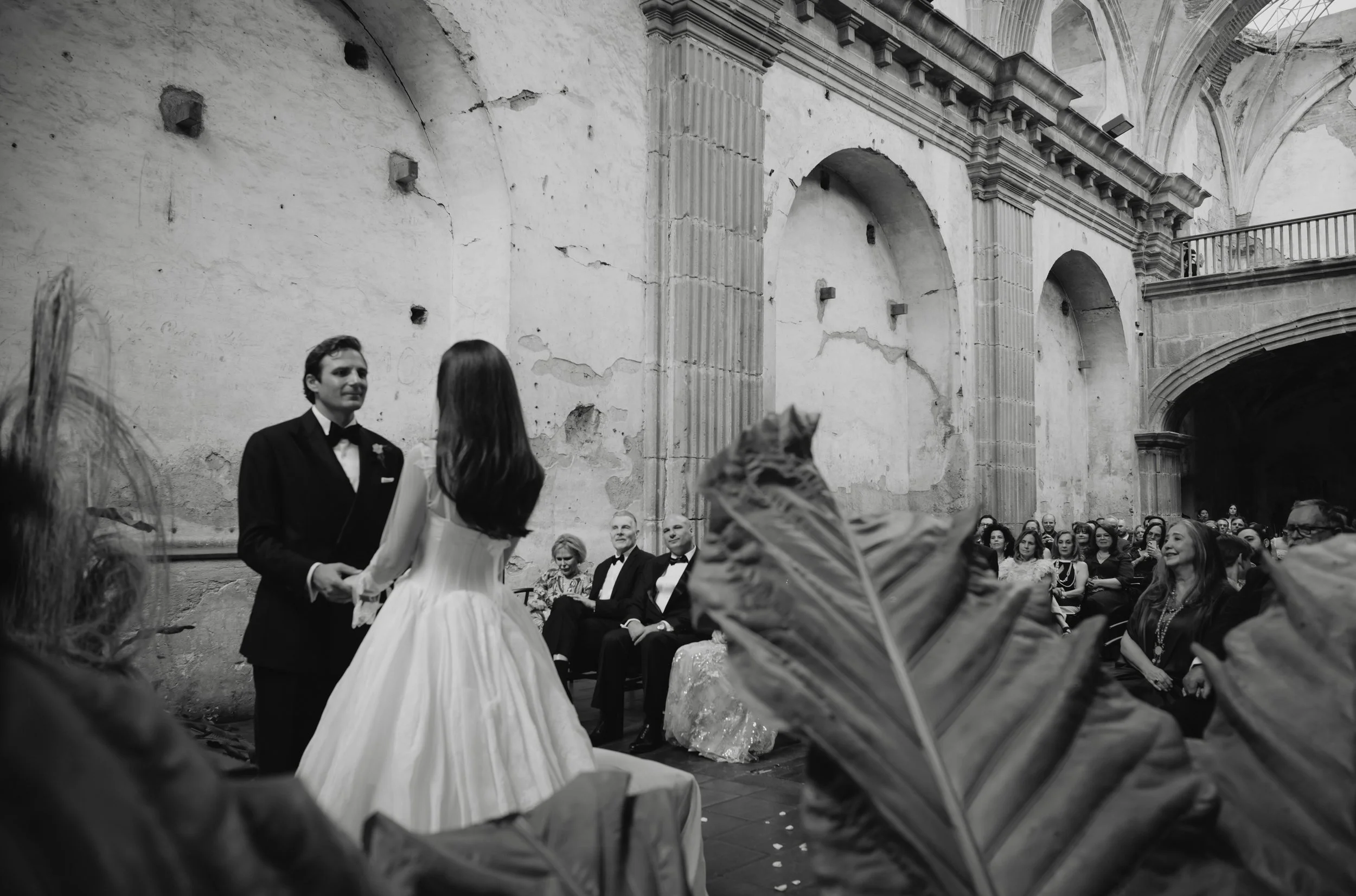 Bride and groom exchanging vows at San José El Viejo