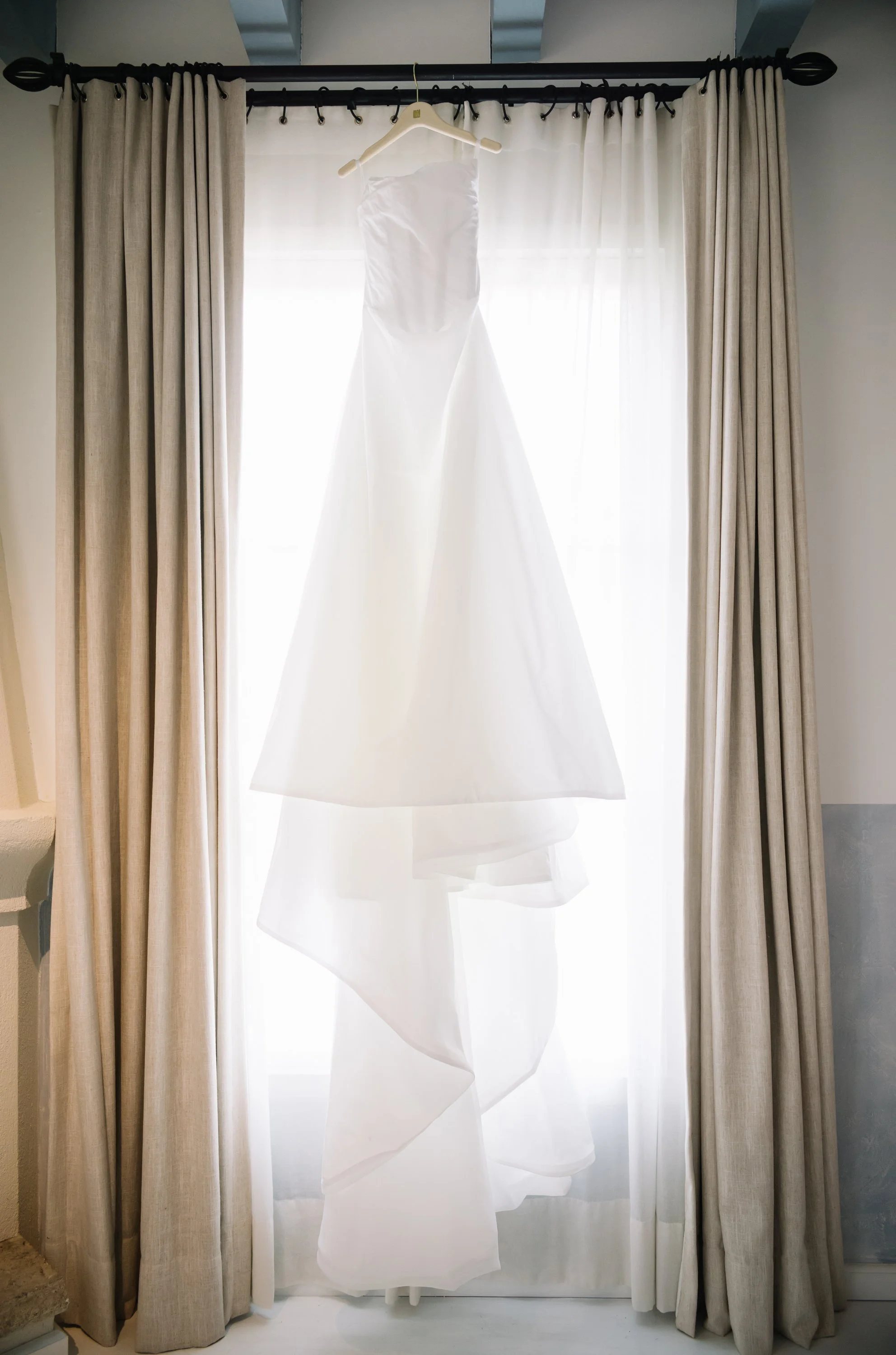 Wedding dress displayed inside the bridal suite at Villa Bokeh, a Relais & Châteaux hotel and wedding venue in Antigua Guatemala.