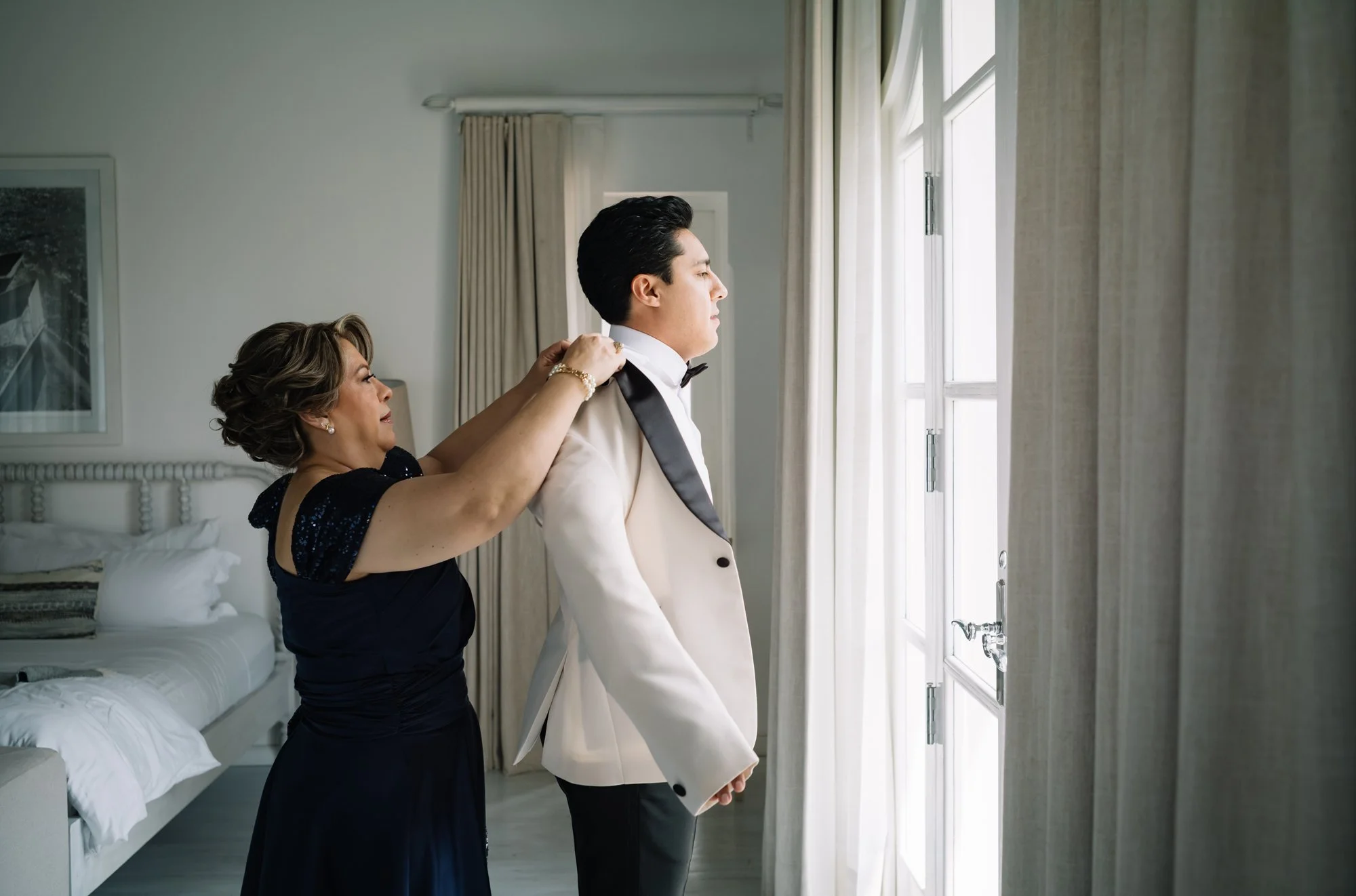 Groom getting ready for her destination wedding at Villa Bokeh in Antigua Guatemala.