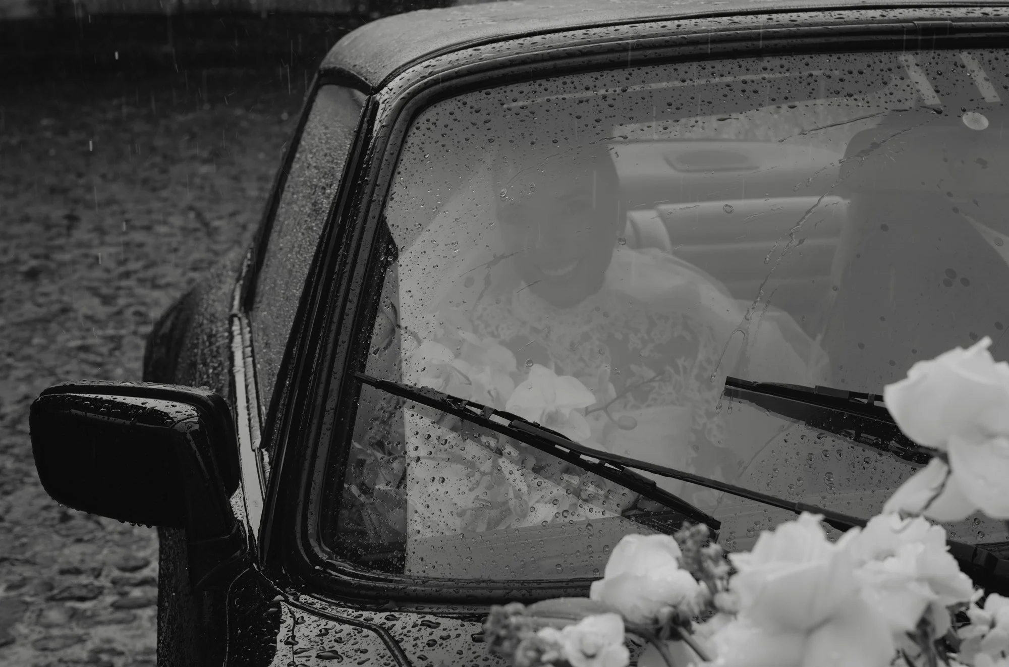 Bride arriving to Villa Bokeh in a vintage Porsche for her destination wedding in Antigua Guatemala.