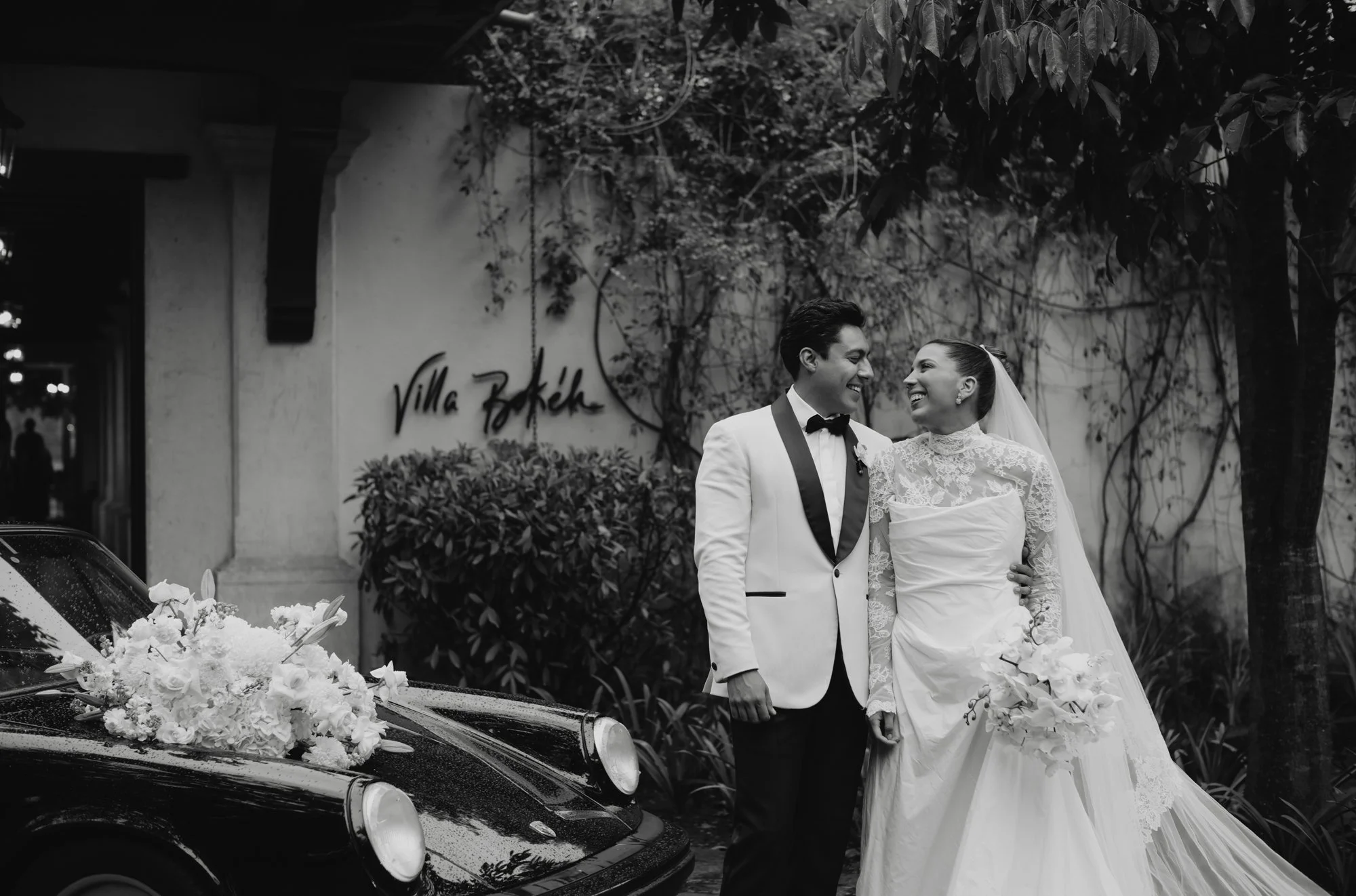 Bride and groom portraits in the lush gardens of Villa Bokeh, a luxury destination wedding venue in Antigua Guatemala.