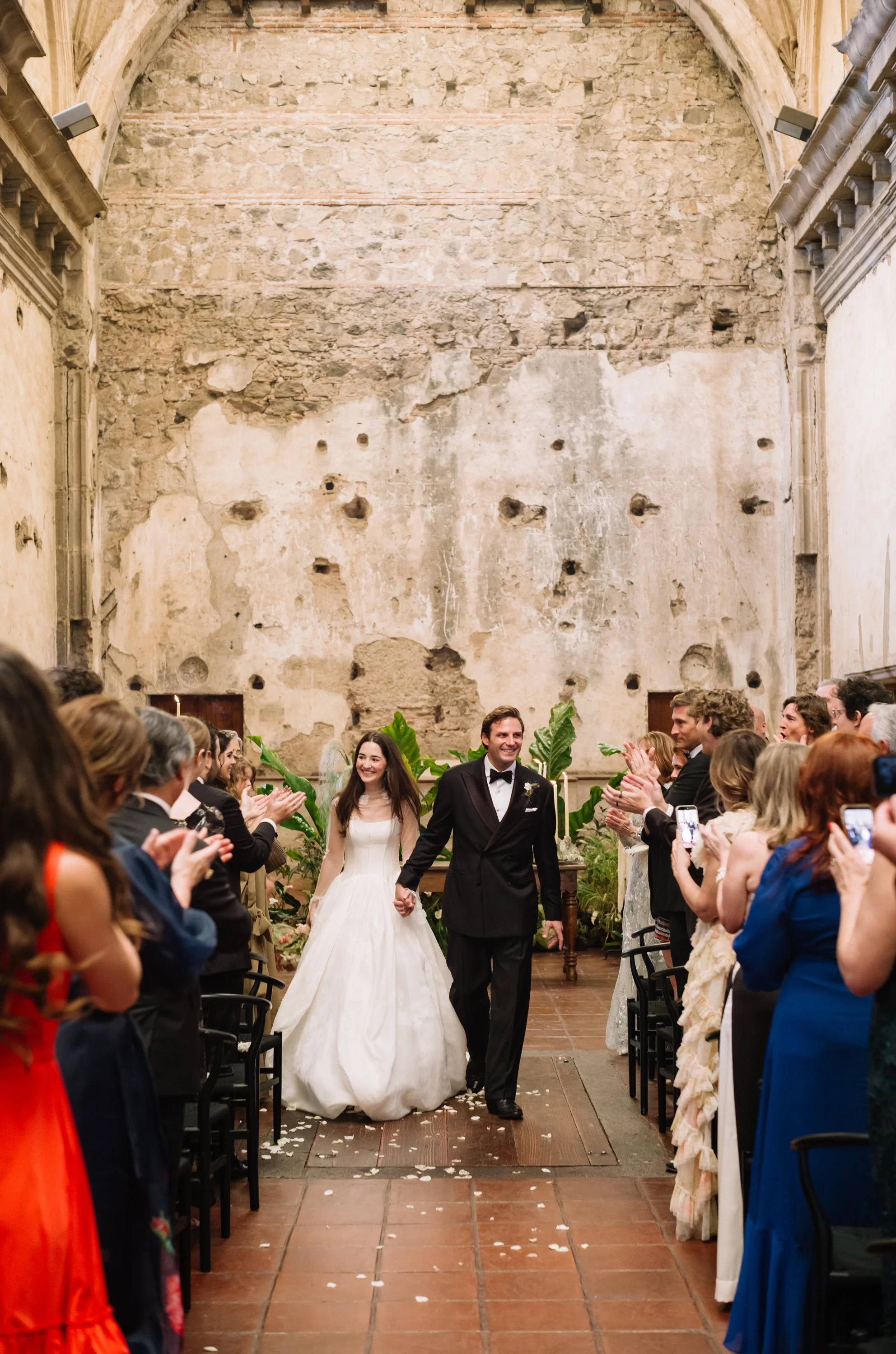 Bride and groom following their ceremony at San José El Viejo