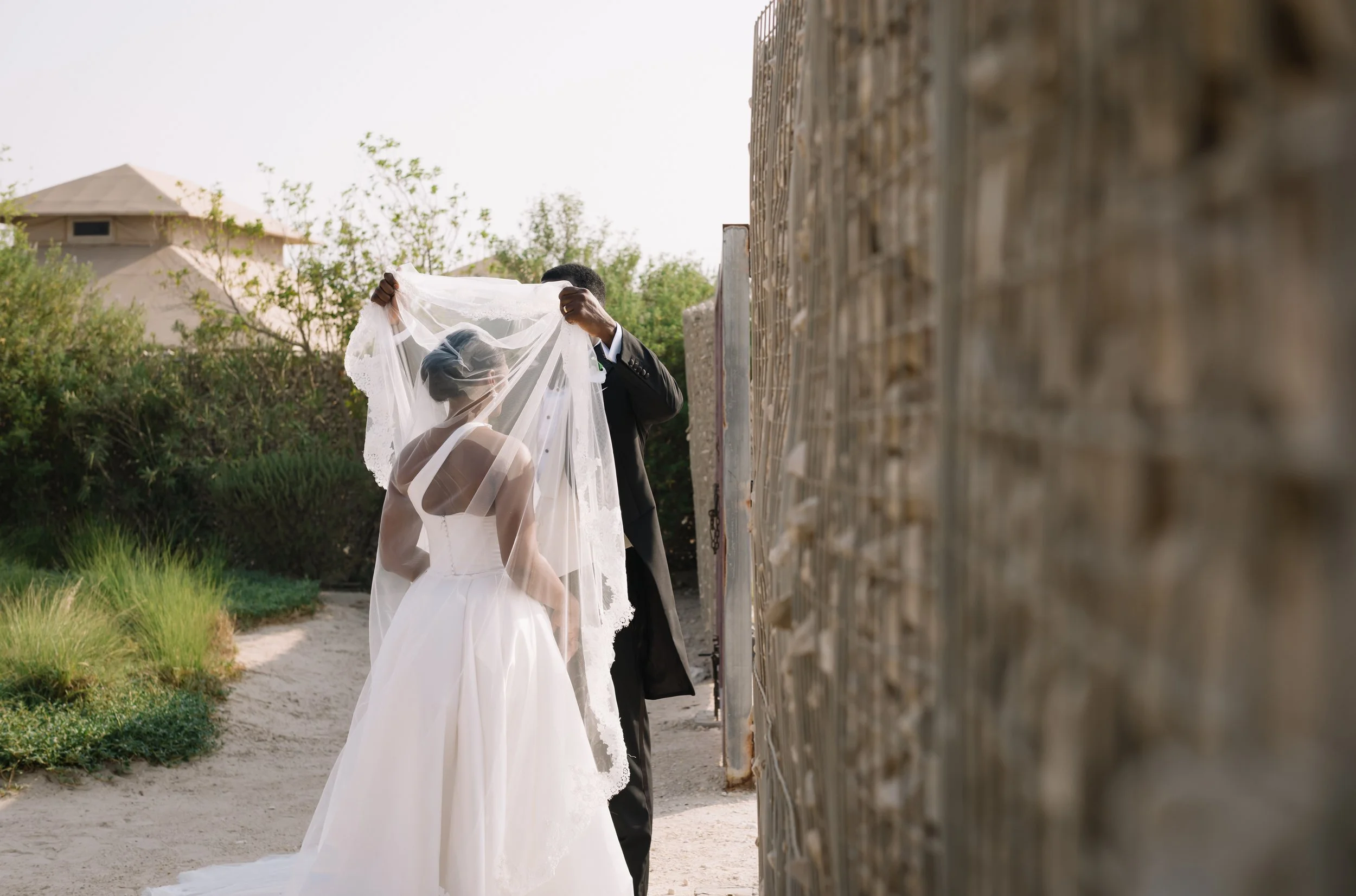 First look in the Qatar desert destination wedding photographer