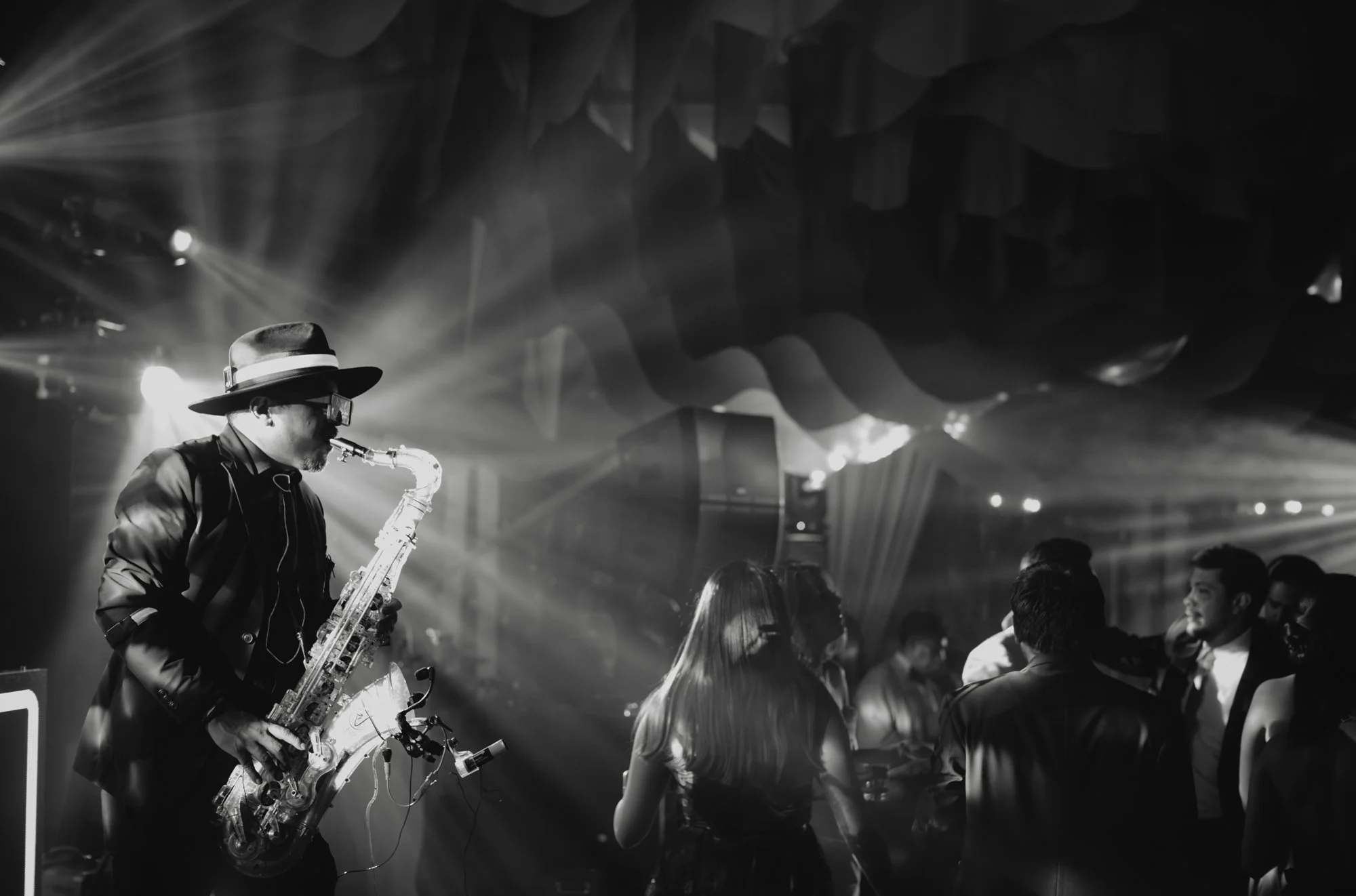 Documentary wedding photography capturing the energy of a luxury reception in Antigua Guatemala.