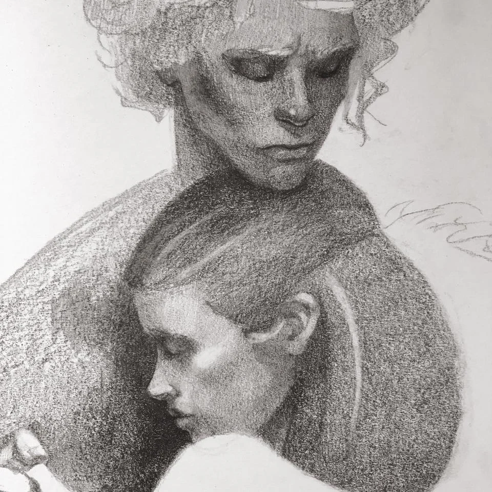 Detailing the facial structures with layers of graphite.
