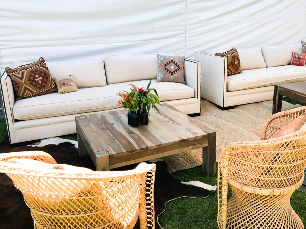 couches and chairs and coffee tables arranged for a wedding.jpg