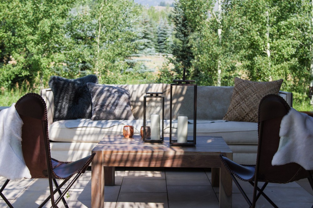 couches arranged outside on a patio for an event.jpg