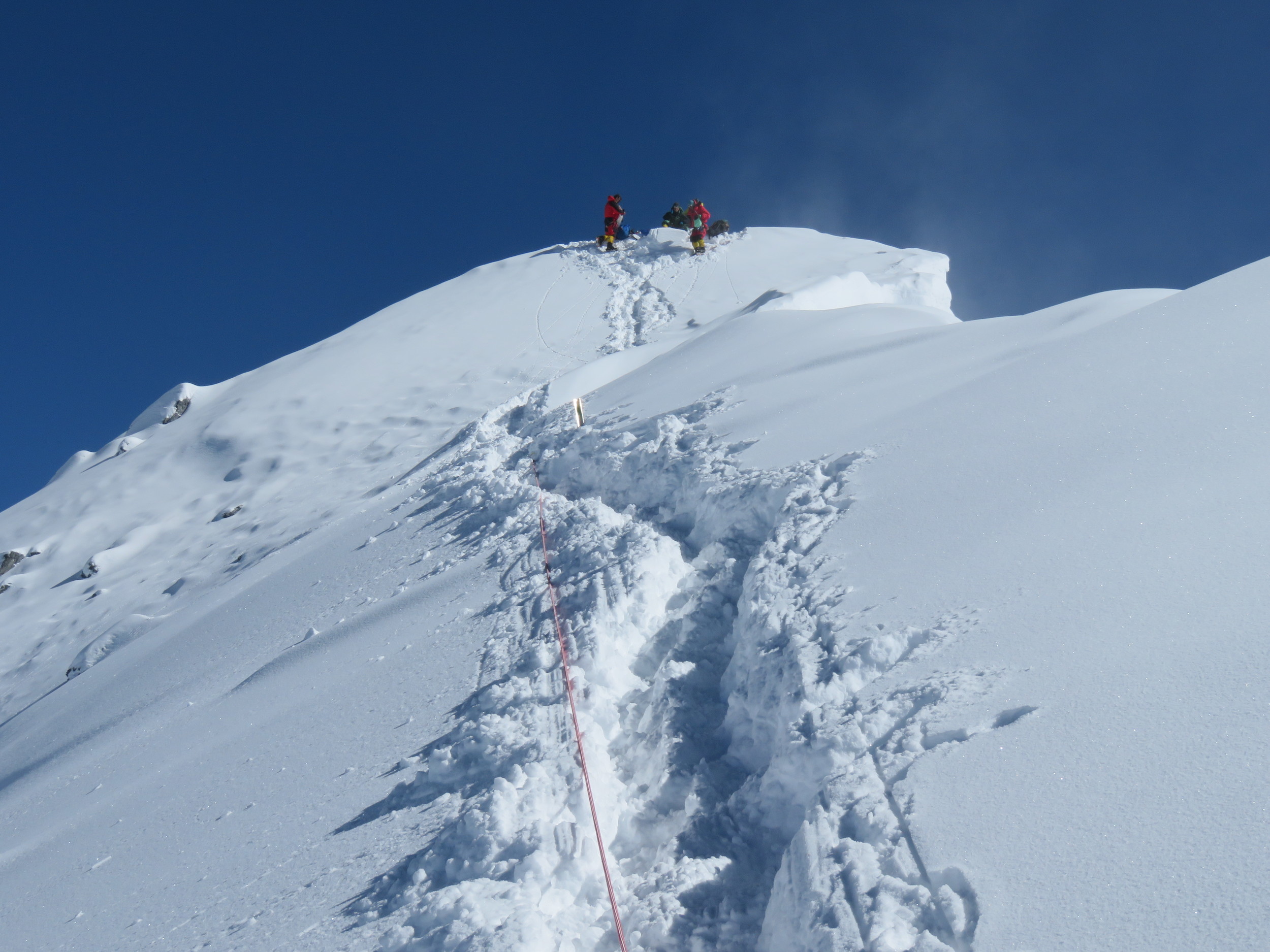 Climbers at the summit of Everest