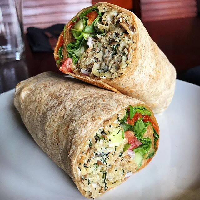 ROASTED SEITAN SALAD WRAP with horseradish, capers, dill, tomato, cucumber, red onion, arugula &amp; roasted red pepper in a whole wheat tortilla - order online for curbside pickup Saturday and Sunday from 2pm-6pm (link in bio)!