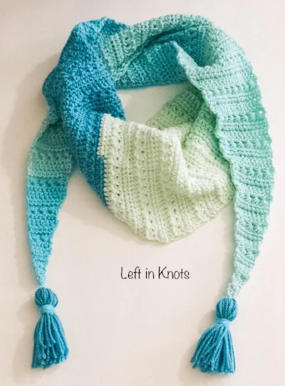 The Snow Drops Mod Scarf is a modern one skein triangle scarf that highlights the stunning texture of the star stitch. You can make this free crochet pattern with just one skein of Caron Cakes yarn or with any worsted weight yarn you have in your stash