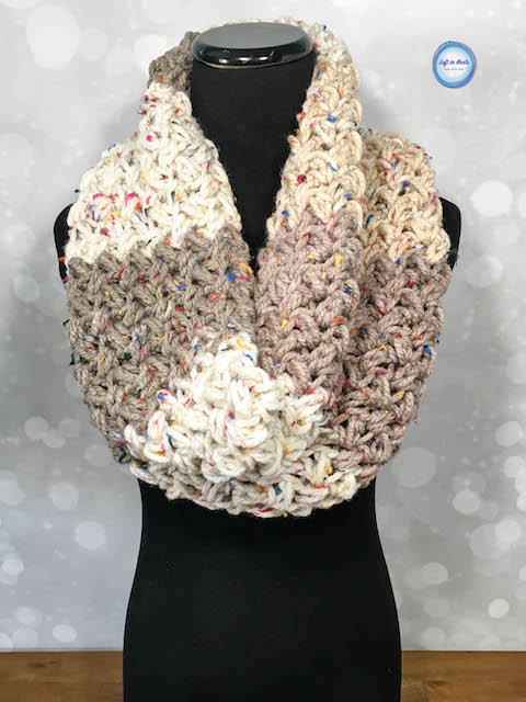 If you have been with me for any length of time here on my little crochet blog, then you may have picked up on the fact that I LOVE: one skein projects, Caron Cakes yarn, texture, and fast, functional and stylish pieces. Sound familiar? Yep! I talk about it all the time. And today's free crochet pattern hits ALL of these marks. Keep reading for the free Sprinkles Cowl crochet pattern