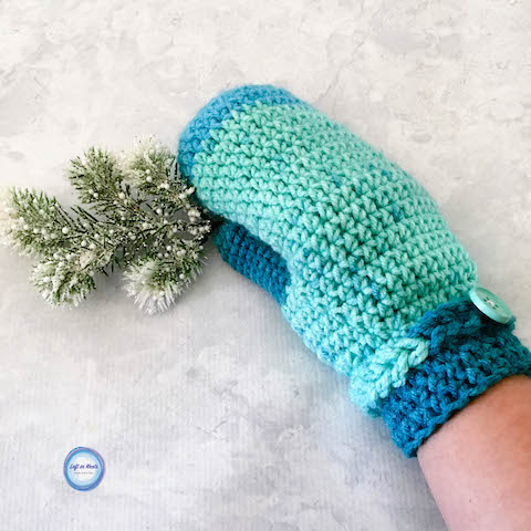Take out one skein of yarn and make a pair of beautiful, warm mittens to add to your gifting stash! The Frozen Fingers Mittens are a free crochet pattern featuring Premier Sweet Roll yarn and are part of the 2017 Holiday Stashdown CAL. I hope you enjoy this fast and simple pattern!
