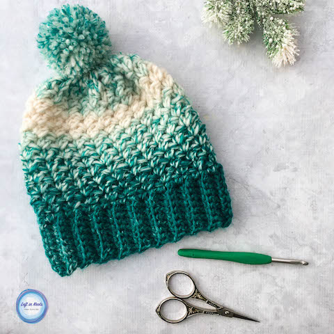 This free crochet pattern combines simple texture with the stunning Lion Brand Scarfie yarn to create a fabulous beginner-friendly hat! The Snowball Slouch Hat takes just half a skein of Lion Brand Scarfie yarn and it is perfect addition for anyone on your last-minute gift list this holiday season because it can be made in four different sizes (baby, toddler, child and adult). This is the seventh and LAST free crochet pattern of my Seven Days of Scarfie 2017 pattern collection.
