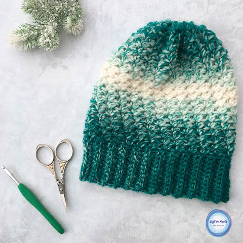 This free crochet pattern combines simple texture with the stunning Lion Brand Scarfie yarn to create a fabulous beginner-friendly hat! The Snowball Slouch Hat takes just half a skein of Lion Brand Scarfie yarn and it is perfect addition for anyone on your last-minute gift list this holiday season because it can be made in four different sizes (baby, toddler, child and adult). This is the seventh and LAST free crochet pattern of my Seven Days of Scarfie 2017 pattern collection.