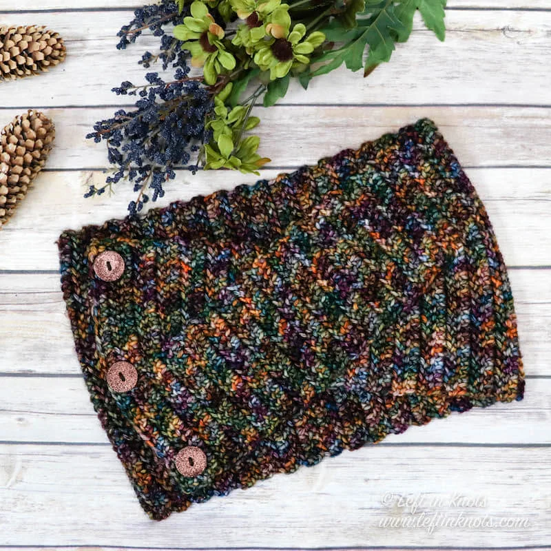 The Monteverde Slouchy Hat is a one skein project that features bobbles and just a bit of filet stitching. This free pattern is easy and fast to make. Use a special skein of hand dyed yarn or any light worsted weight yarn; then top it with a faux fur pom for a modern touch.
