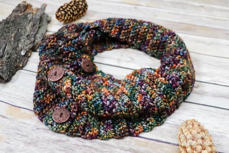 The Monteverde Slouchy Hat is a one skein project that features bobbles and just a bit of filet stitching. This free pattern is easy and fast to make. Use a special skein of hand dyed yarn or any light worsted weight yarn; then top it with a faux fur pom for a modern touch.
