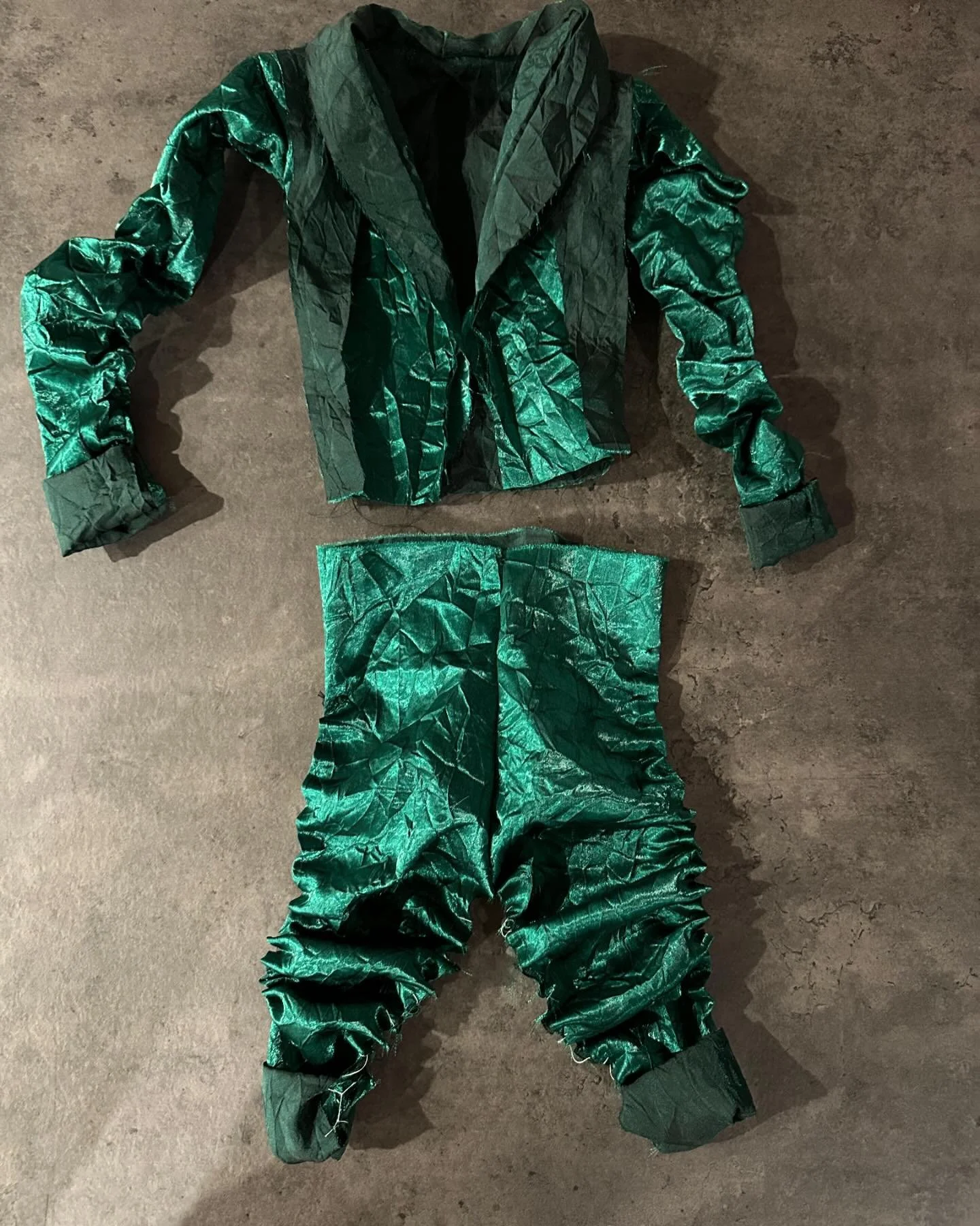The challenge: create a zero waste pattern. 

My challenge within the challenge: to create a (somewhat) fitted garment without draping.

My concept is a party suit in my signature green, for the person who loves to stand out. My concept left with me 