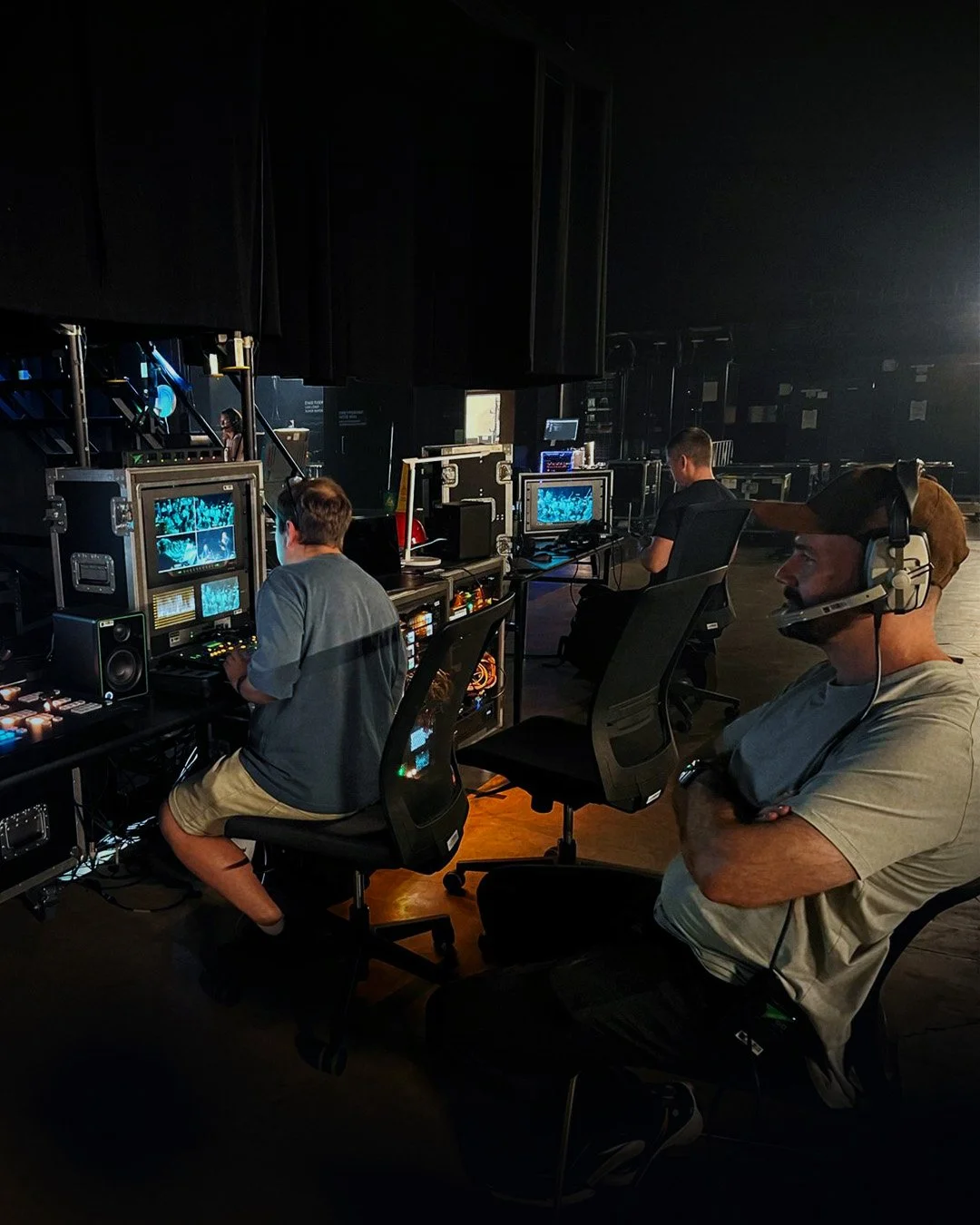 Michael O'Halloran monitoring screen visuals behind the scenes at a Concert Lab production with the Sydney Symphony Orchestra.
