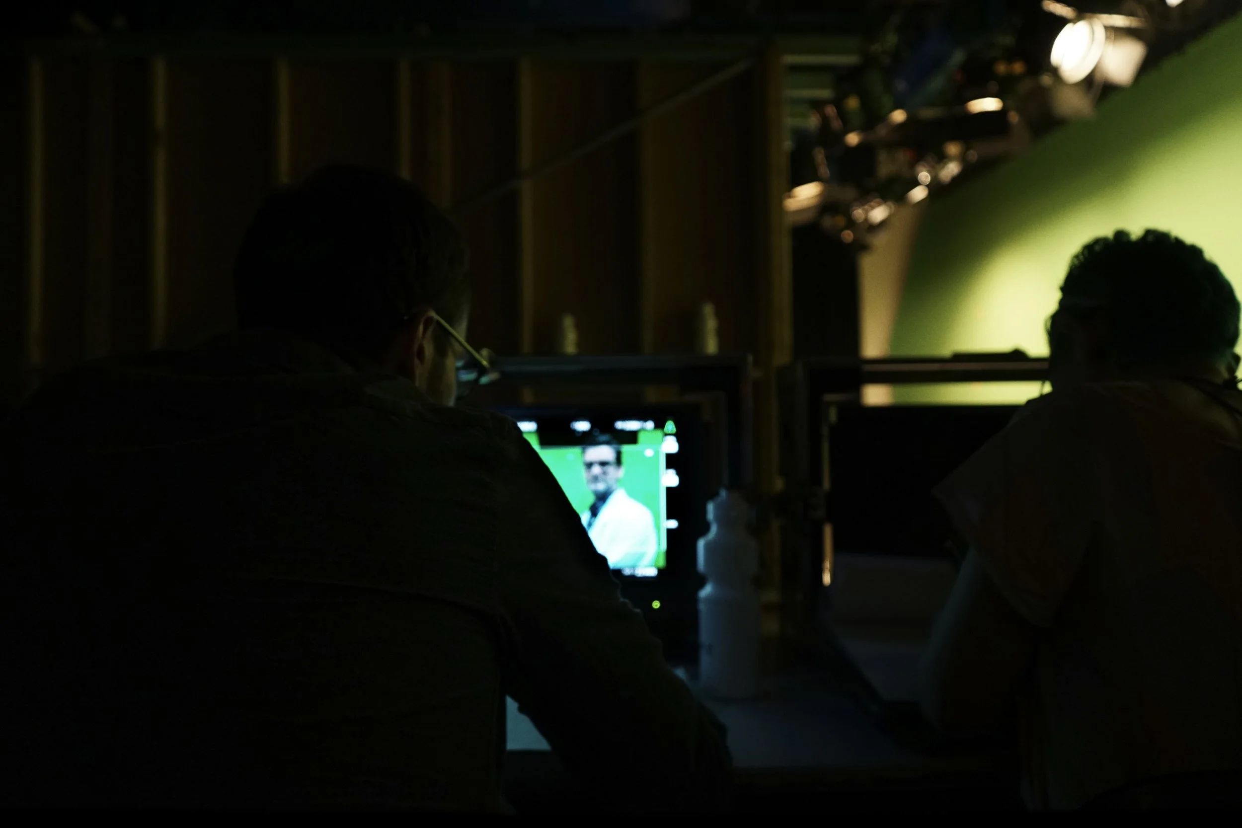 Behind the scenes on SPACE/TIME, with crew viewing the monitor during filming.
