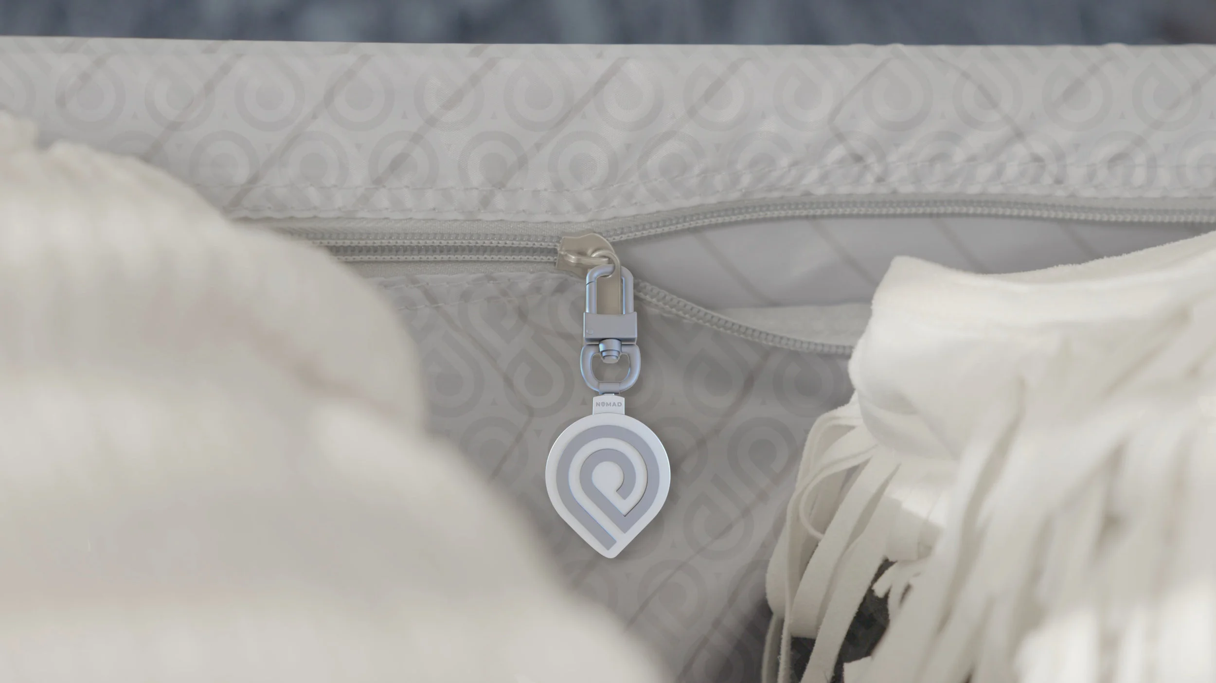 Nomad RFID Reader clipped into luggage.