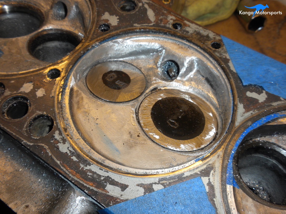 Datsun Cylinder Head Chamber Ground Down Valve.JPG