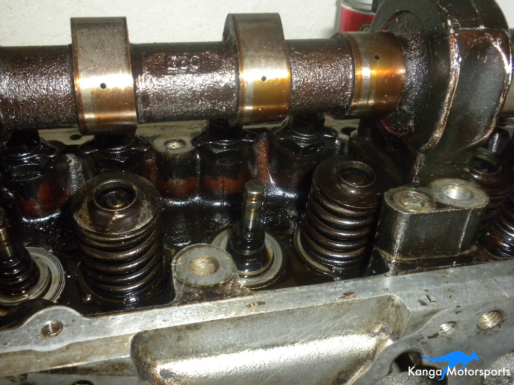 Removing Springs Datsun Cylinder Head.JPG
