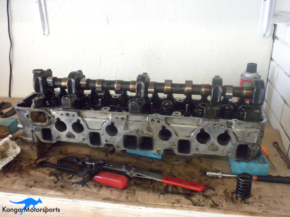 Cleaning the Gasket Surface Datsun Cylinder Head.JPG