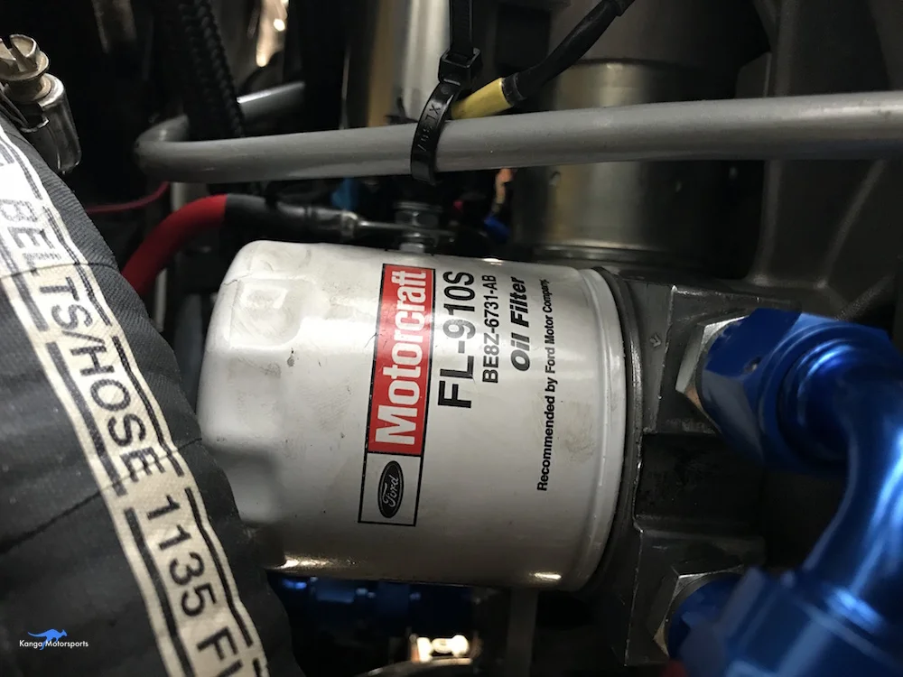 Kanga Motorsports Spec Racer Ford Gen3 Oil Change Filter Interferes with Fuel Hose.jpg
