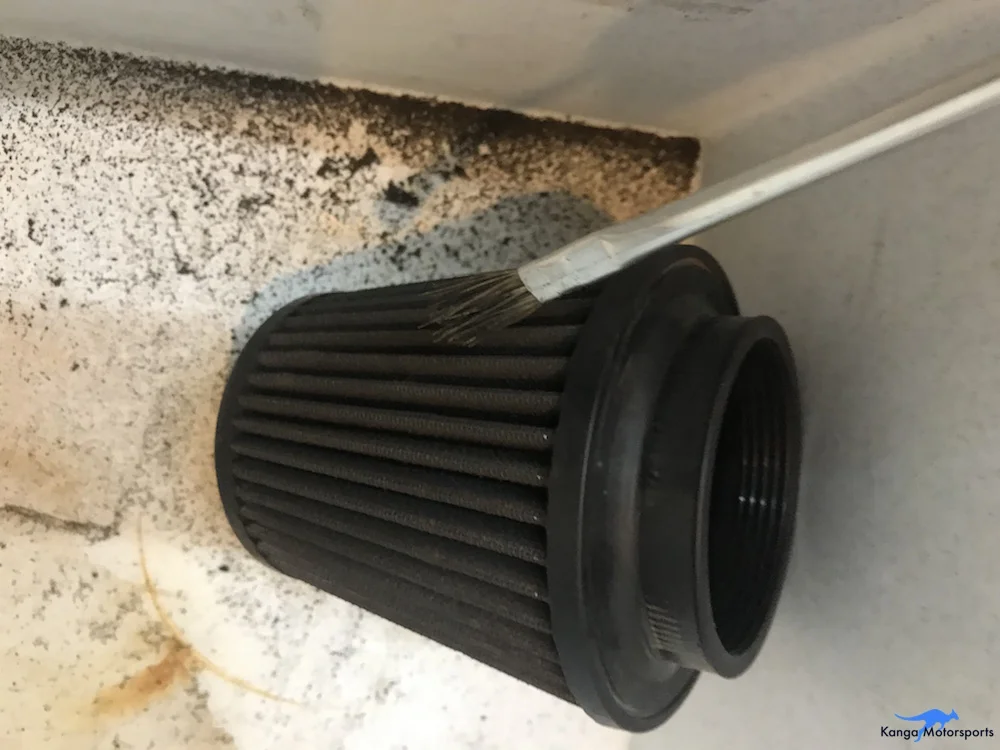 Kanga Motorsports Spec Racer Ford Gen3 Air Filter Maintenace Tap and Brush Out Heavy Dirt.jpg