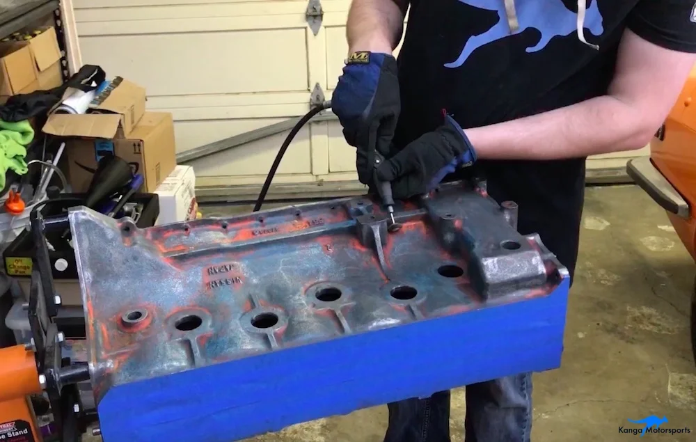 Kanga Motorsports Datsun 240z Engine Build Removing Engine Block Paint and Rust Flap Wheels.jpg