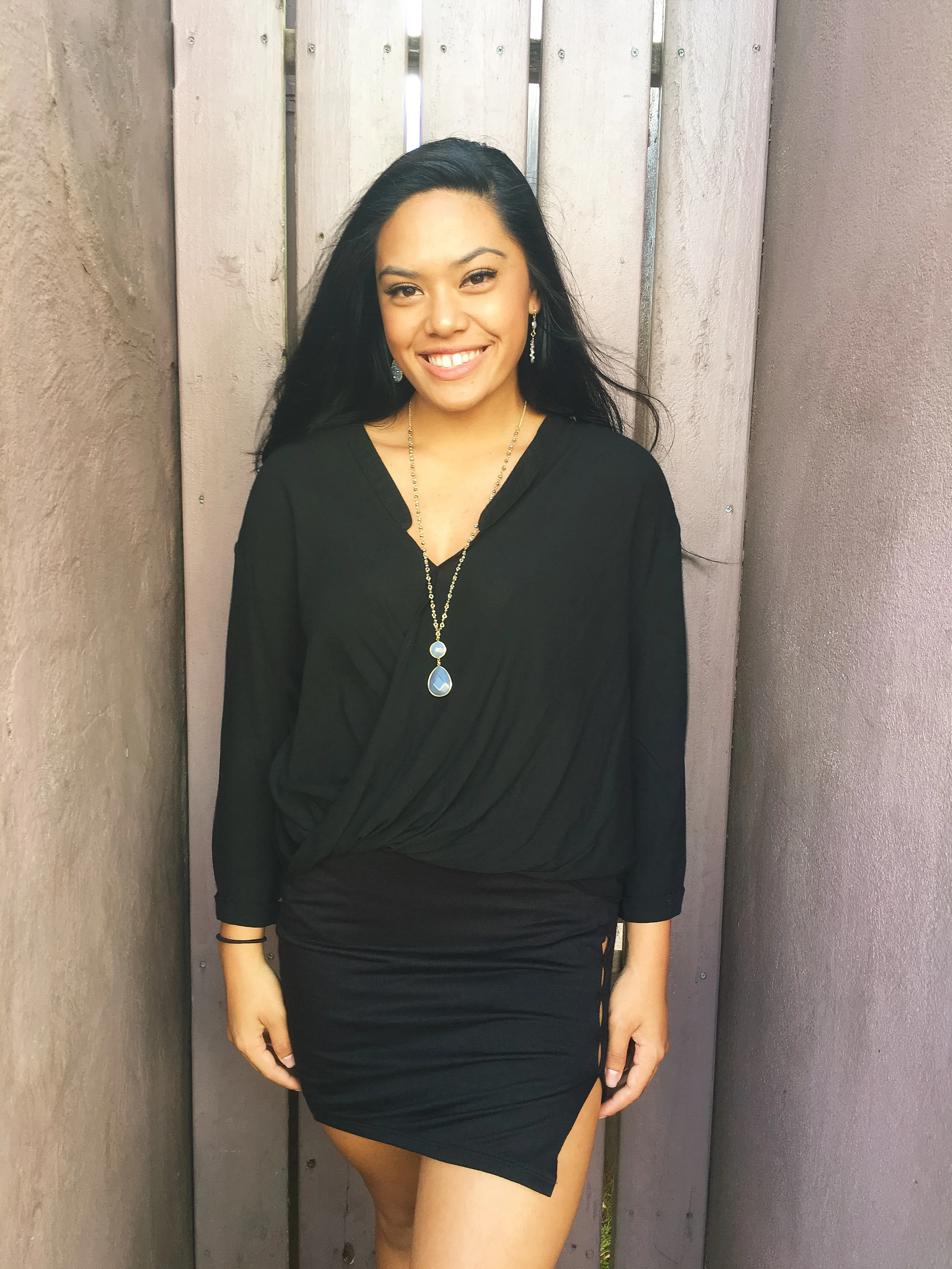 Okay okay, if skirts just aren't your thing, this blouse is sure to be! It goes with everything, and is made of a comfortable, lightweight material. It can go from the office, right into a night out.