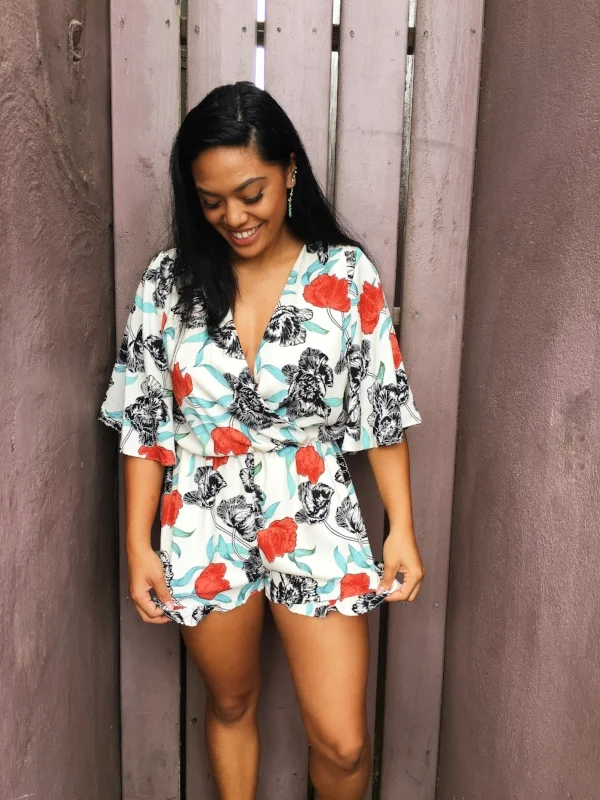 One of our favorites -- we love the print on this one! Do you have a bigger bust, broad shoulders, or a narrow waist? If so, this romper is for you. The "blousey" top is perfect if you need to give the girls a good home, and the kimono-like sleeves are great for down playing broad shoulders. If you have a narrow waist or hips, the flounce on the hem will accentuate your lower half and give you the curves you desire.
