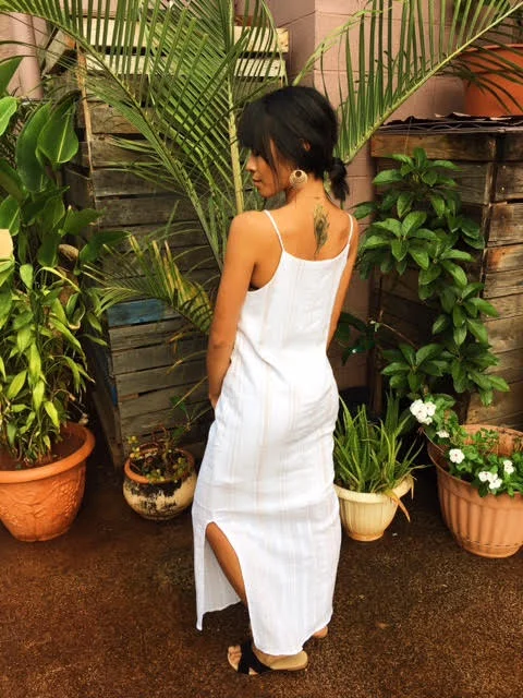 A maxi dress, for petite? Yes, they exist! We especially love this one because of the lower slit. When you're petite, you don't want too much fabric otherwise it looks like the garment is too big for you. Opt for items where there may be a "peek-a-boo" opening (slits, cold-shoulders, off the shoulder, etc).