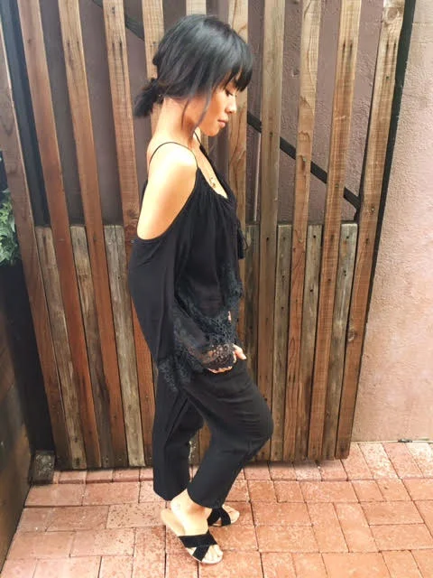 Petite babes, cropped pants are your best friend. We paired ours with a "peek-a-boo" top, like this cold shoulder cropped top. If you do go for a longer length pant, make sure it's fitted, or tapered to the ankle. It'll enhance your height, not drown you.