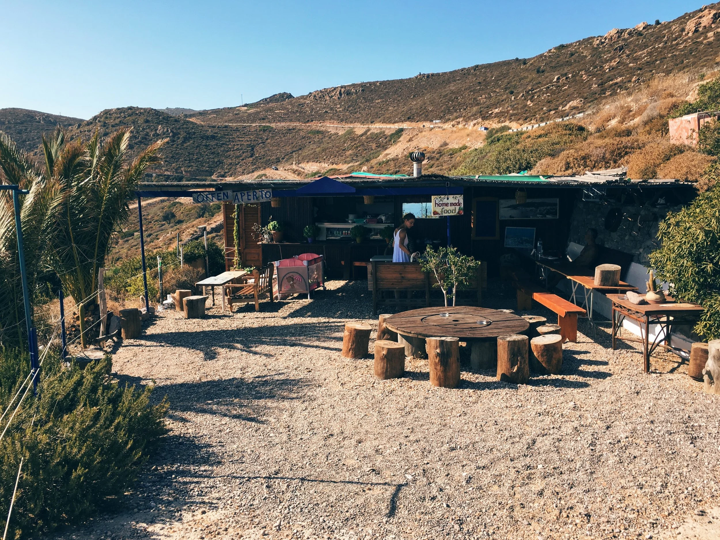 Atop the hill from Didymes beach sits this magical food joint: Nikos and Theologia (pictured below)