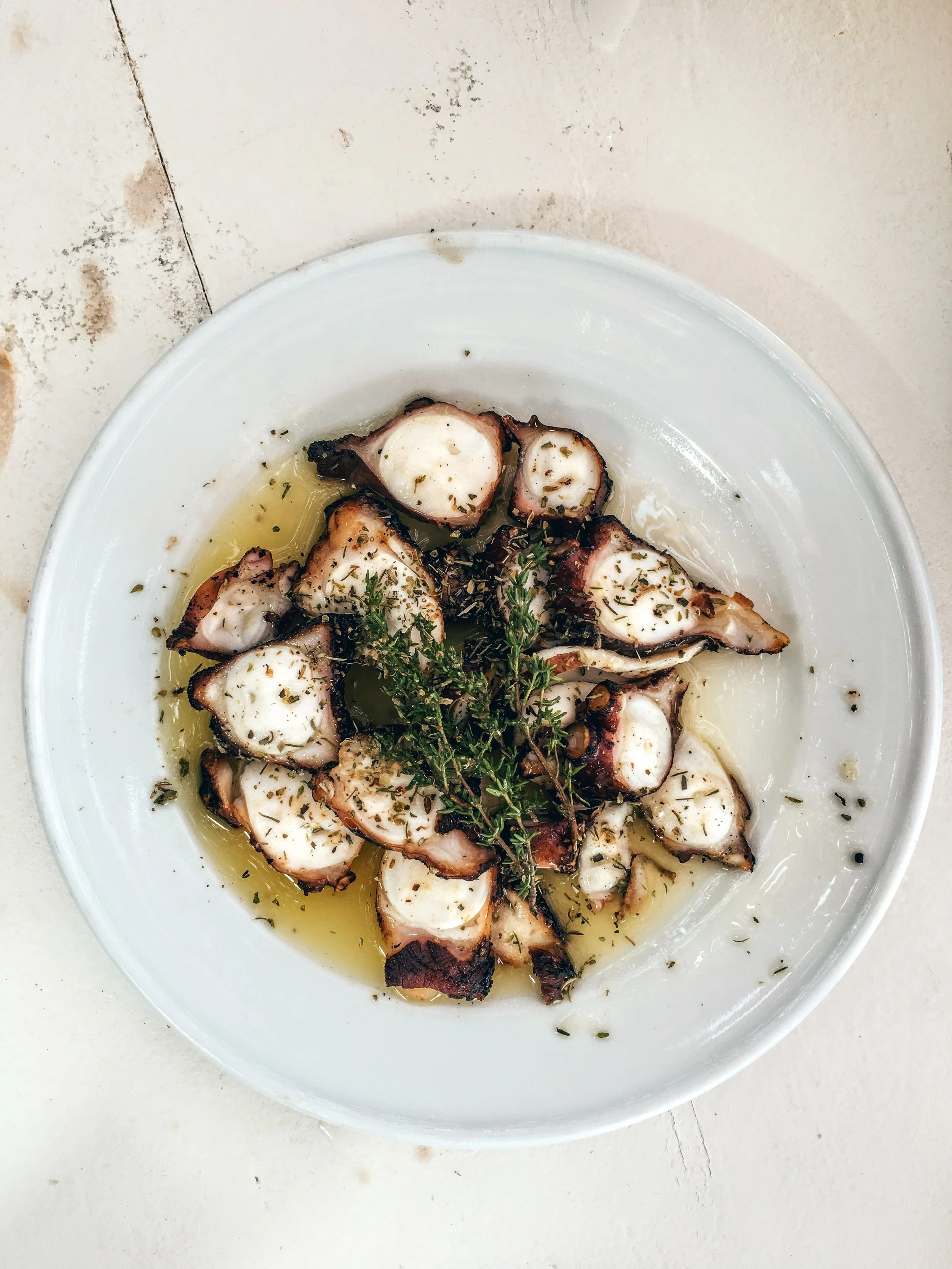 Grilled octopus with fresh rosemary
