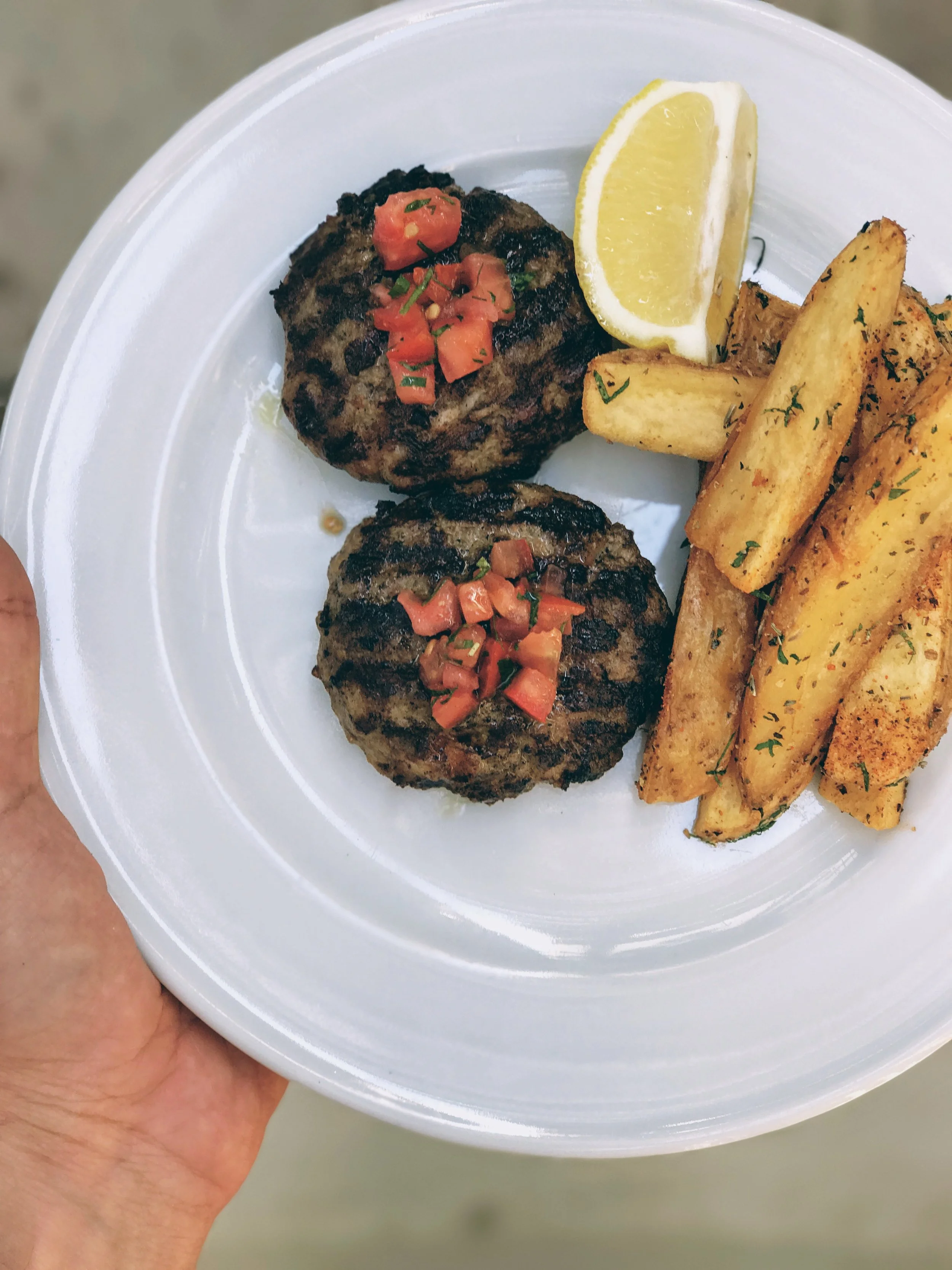Grilled beef patties served with thick-cut Naxos french fries