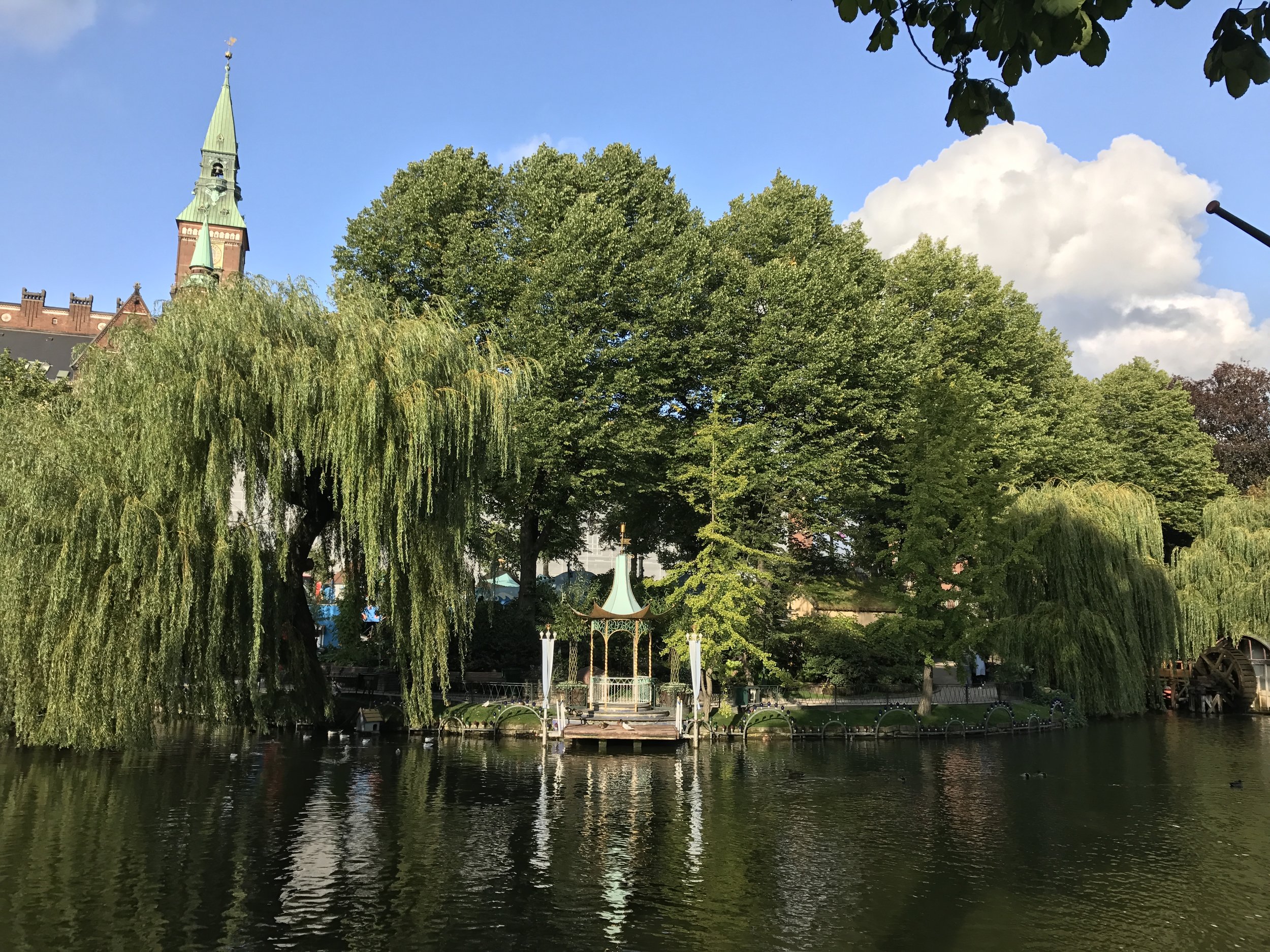 Tivoli Gardens is part garden, part amusement park, and part theatre.