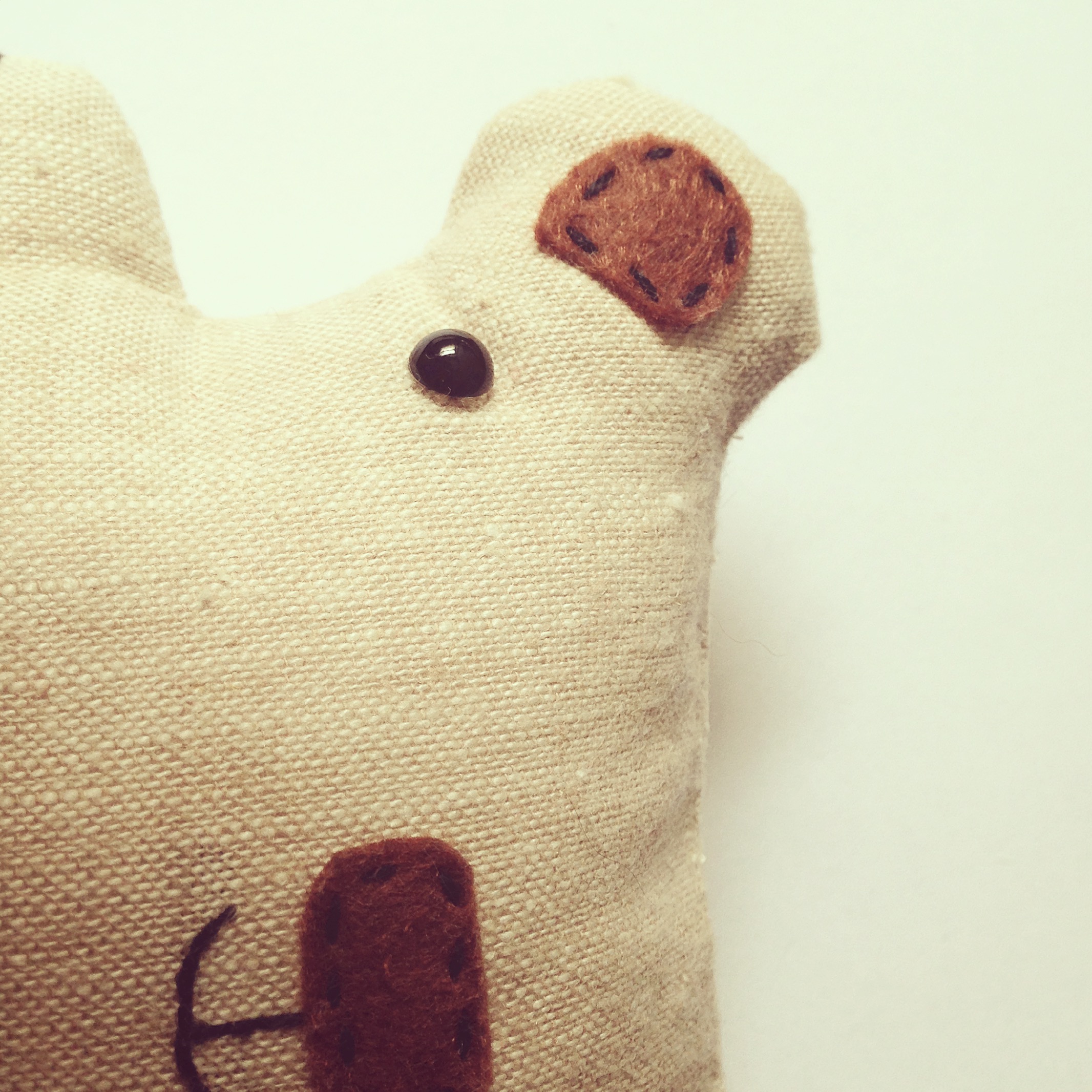 Hand embroidered features