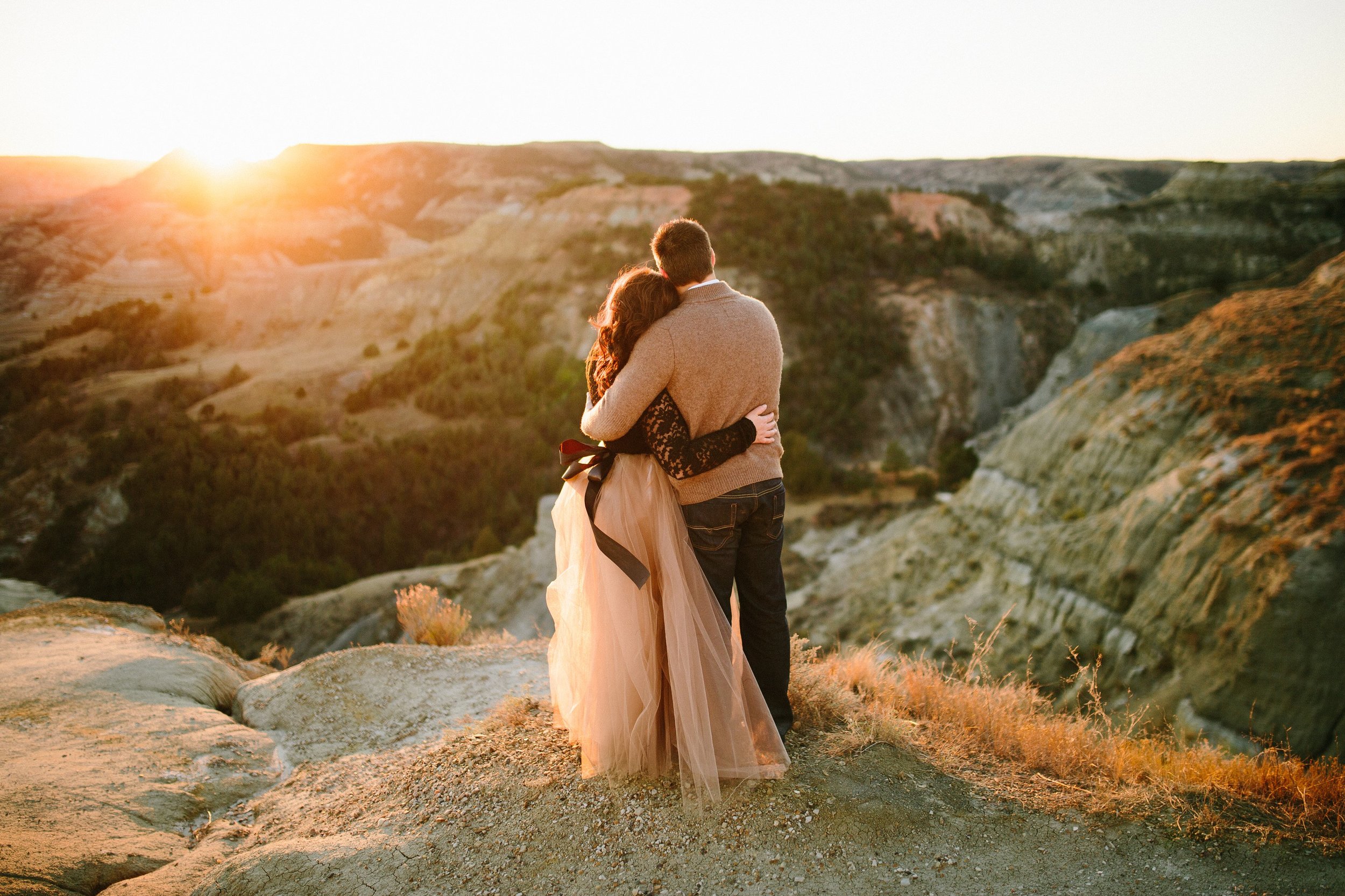 Romantic Sunset Couples Session at the Theodore Roosevelt National Park in North Dakota by Seattle WA destination photographer Janelle Elaine Photography with pink tulle skirt.jpg