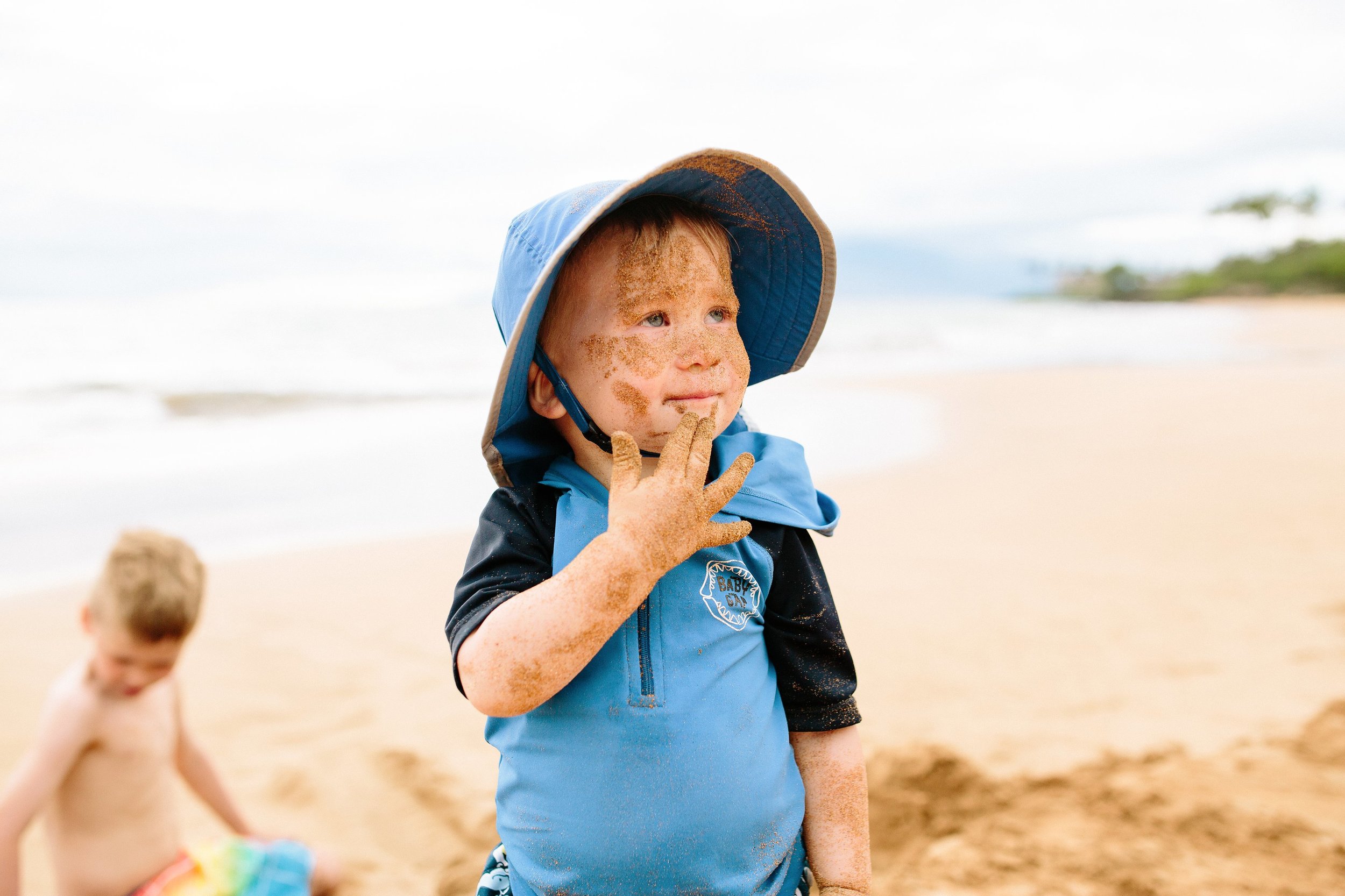 Kid eating sand Family Beach Day Photo Session on Maui by Seattle Lifestyle Photographer Janelle Elaine Photography.jpg