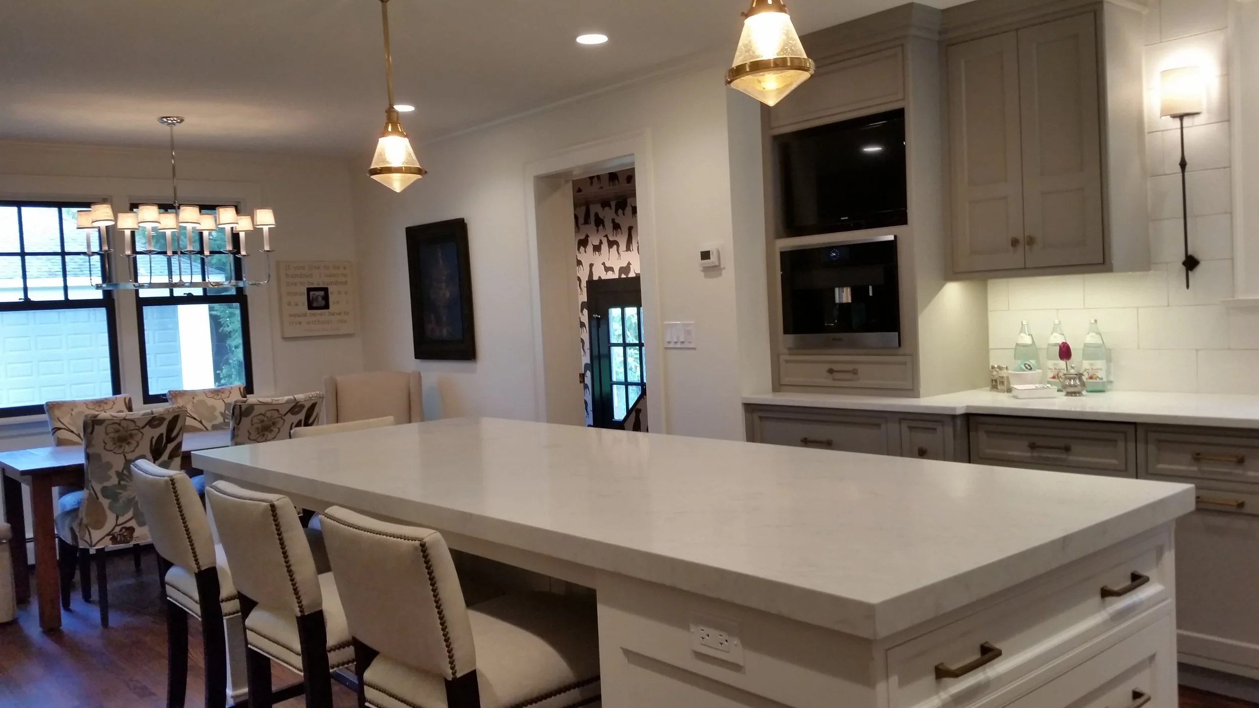 Great design matters. 1928 home has a kitchen with room for 4 at the island and 6 in breakfast nook!