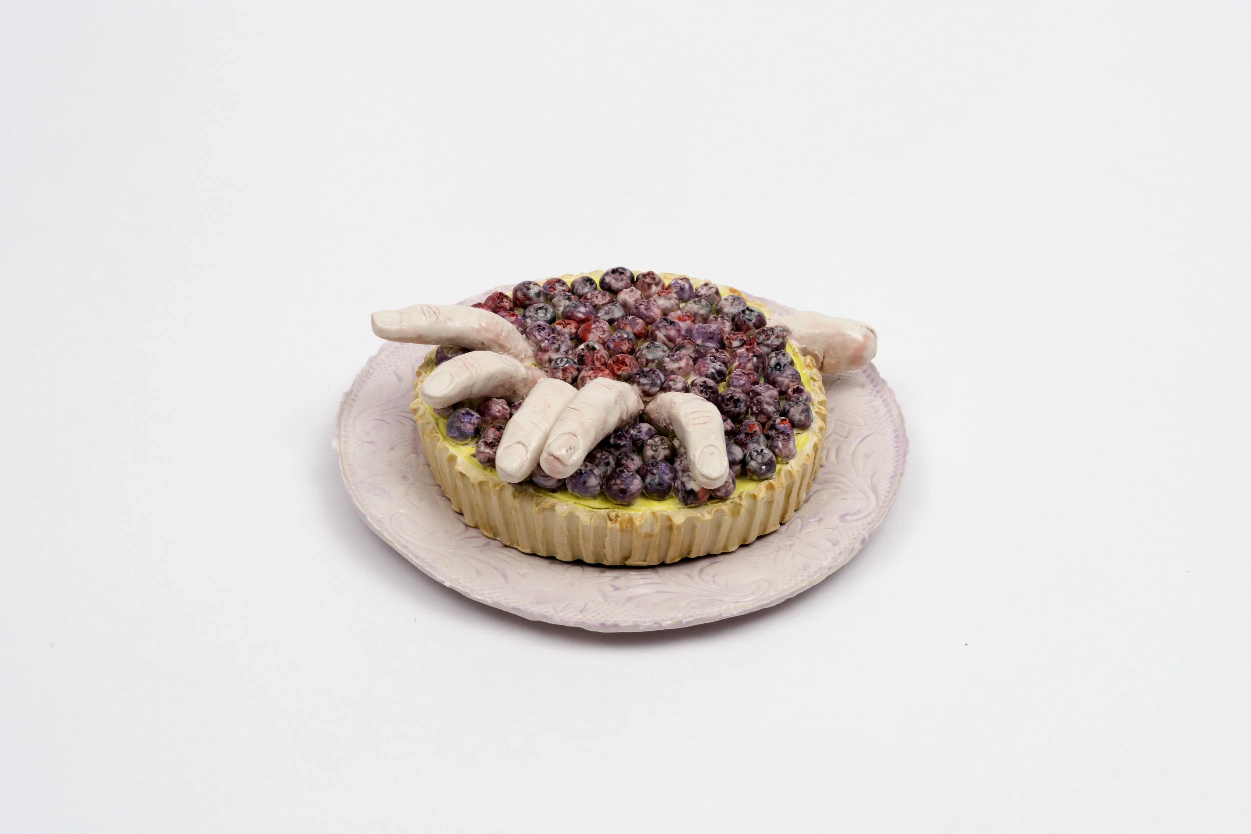 Monica Banks, Confection , glazed English porcelain, 2 5/8” x 7 3/8”d