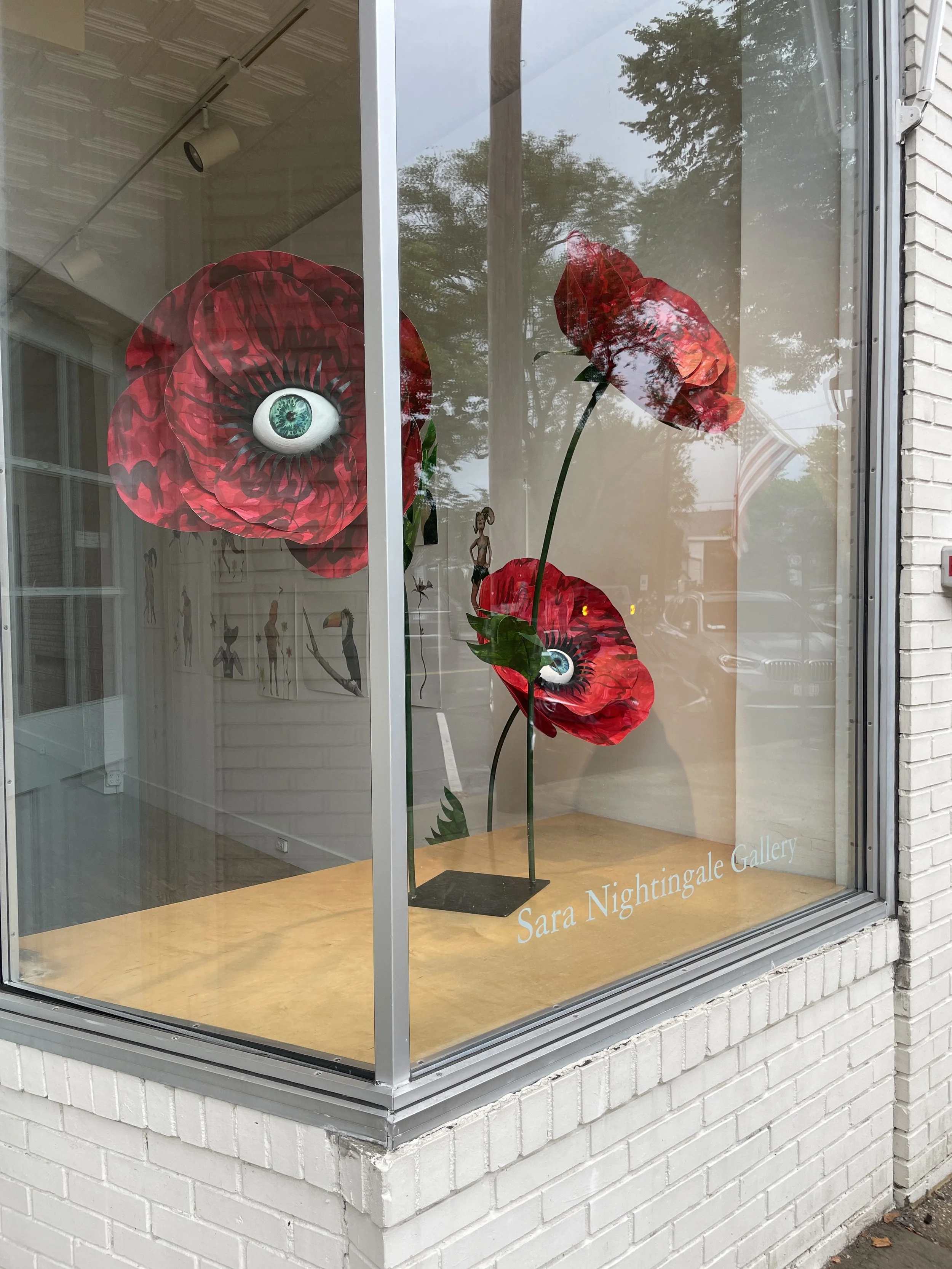  Yuliya Lanina,  Gazing Blossoms , mixed media, 60" x 36" x 36" (variable), single stem: $900, double stem: $1,600 